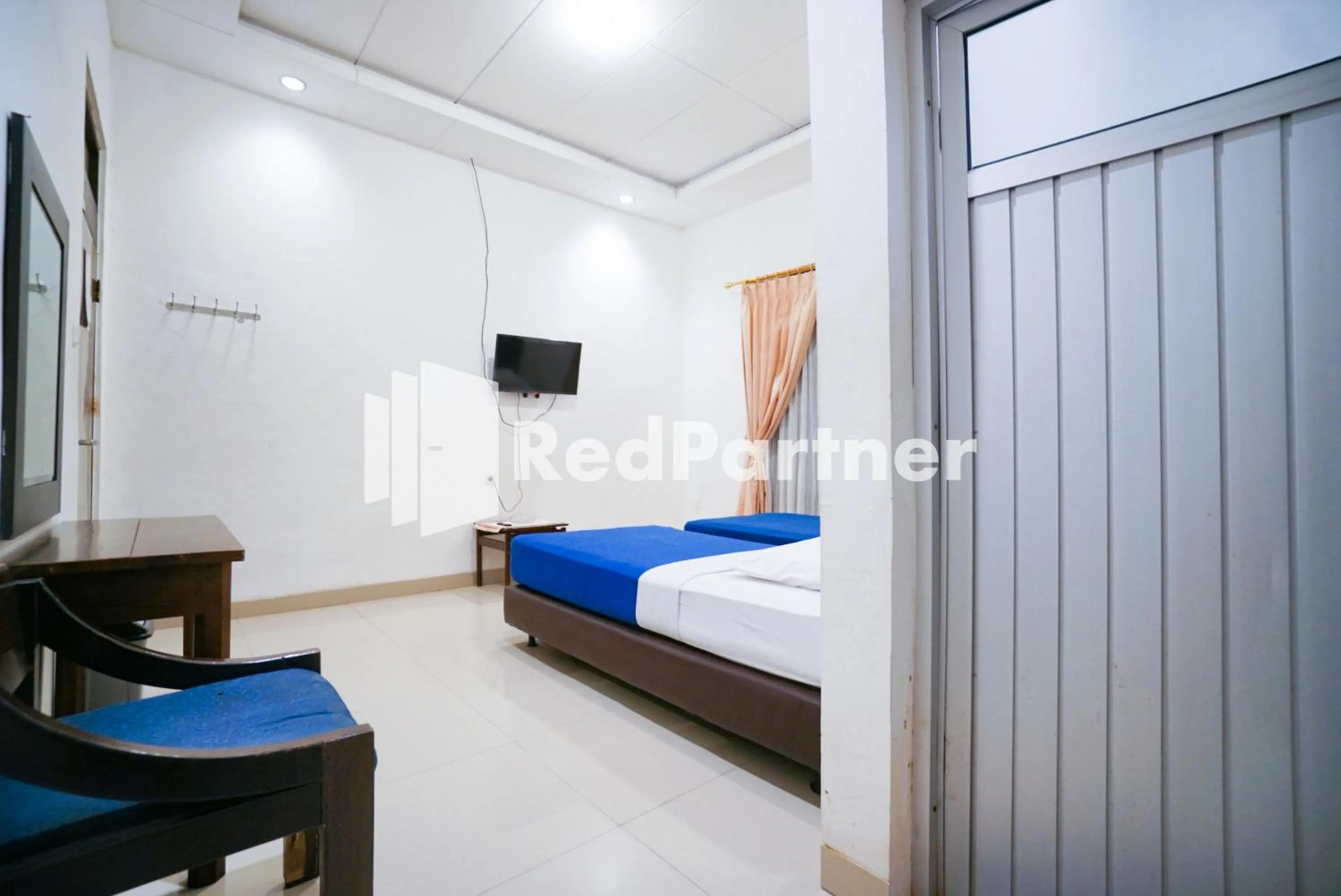 Bed in Hotel Borobudur Kemayoran Syariah Mitra RedDoorz