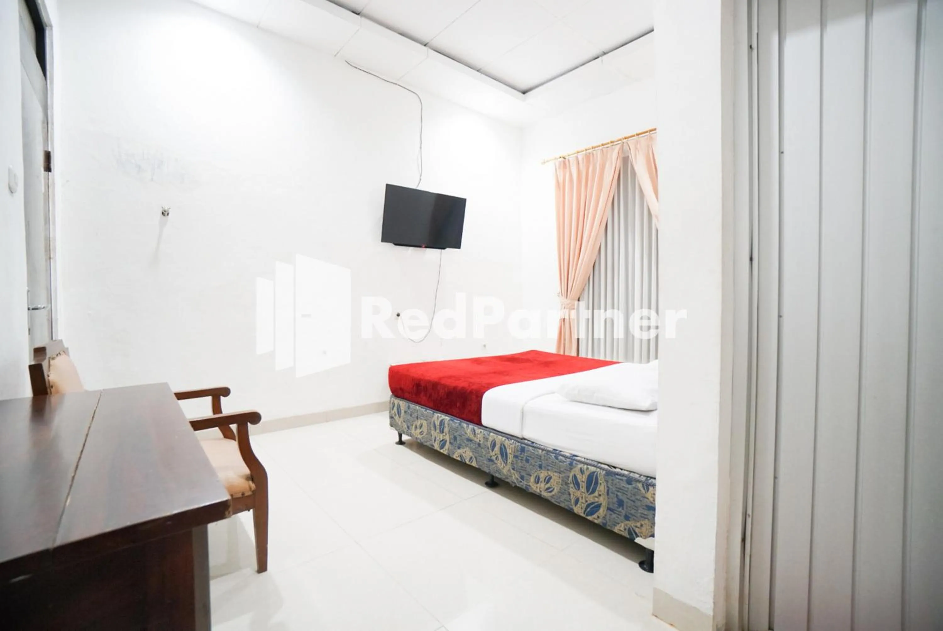 Bed in Hotel Borobudur Kemayoran Syariah Mitra RedDoorz