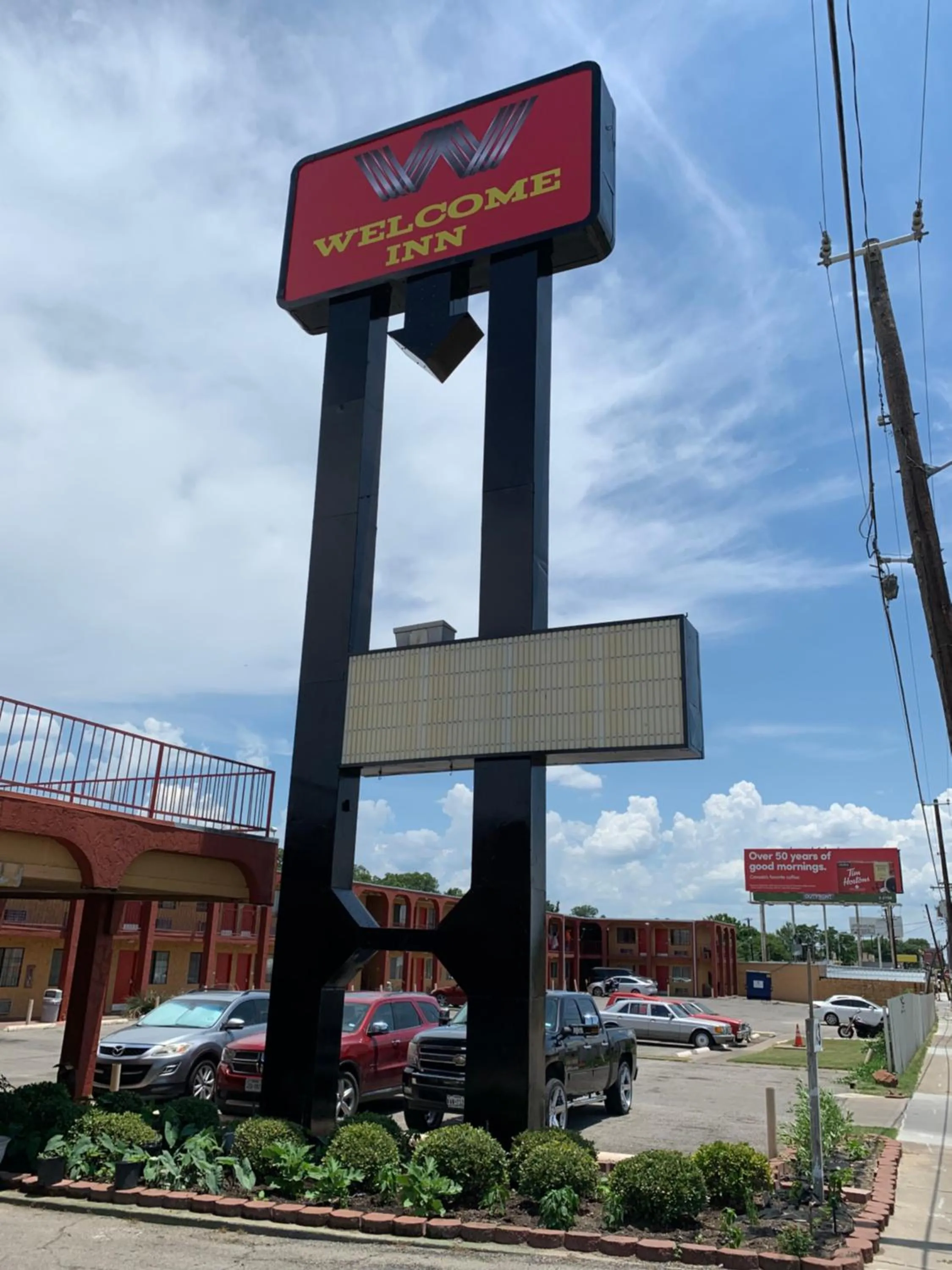 Property logo or sign in Welcome Inn