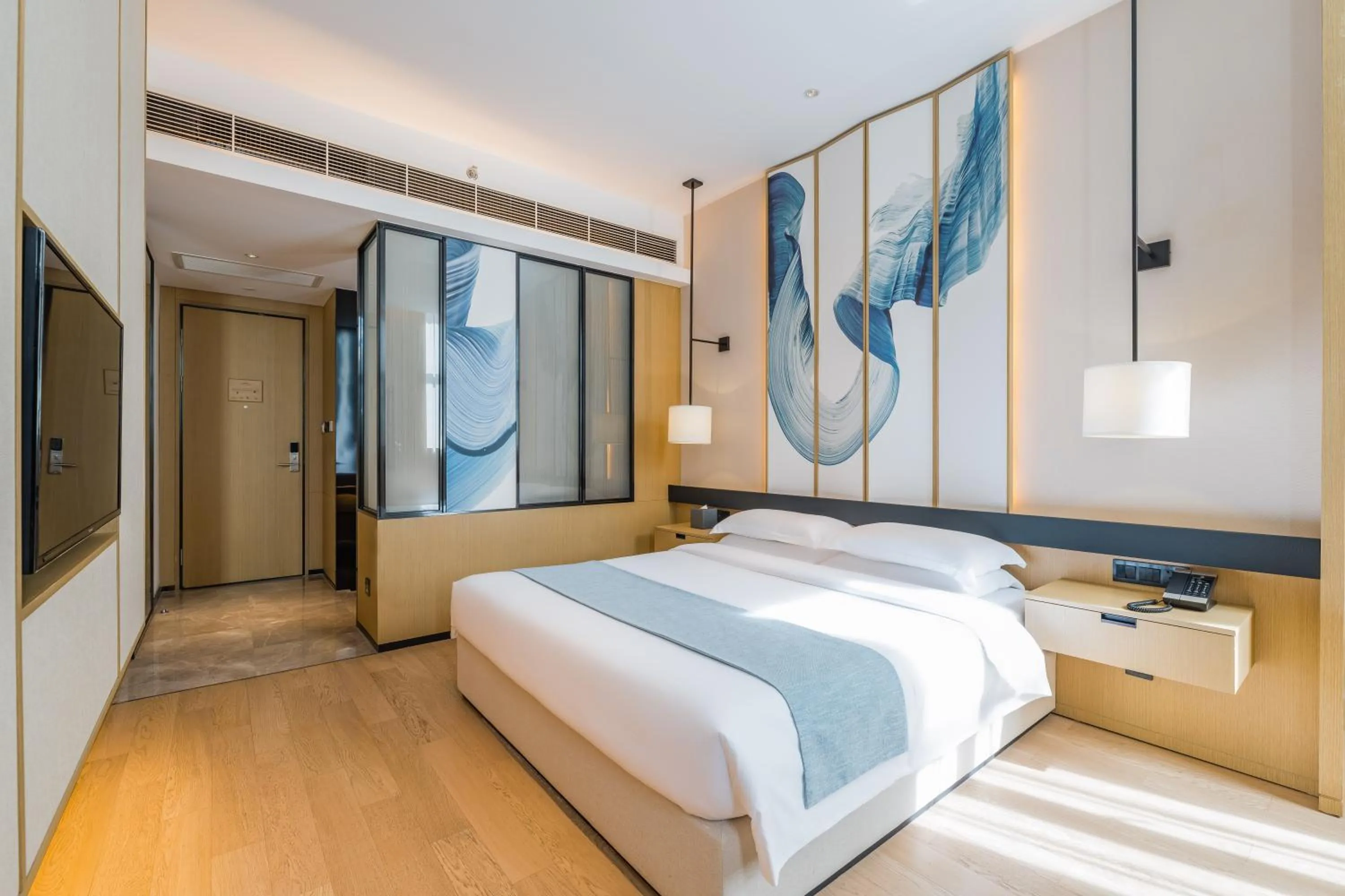 Bed in Yun He Ye Bo Hotel (Shanghai International Tourist Resort Wild Animal Park)