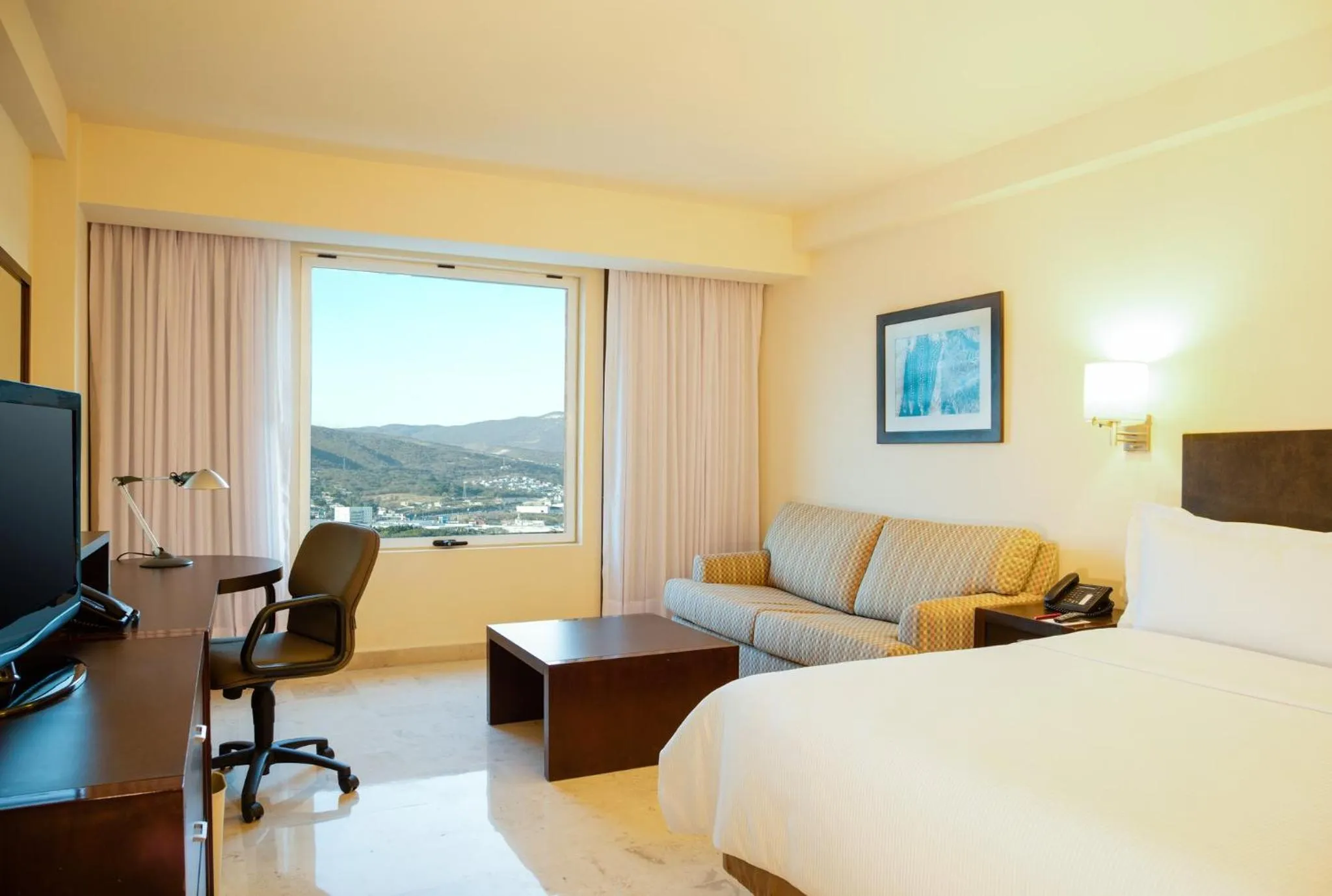 Photo of the whole room, Bed in Fiesta Inn Tuxtla Gutierrez