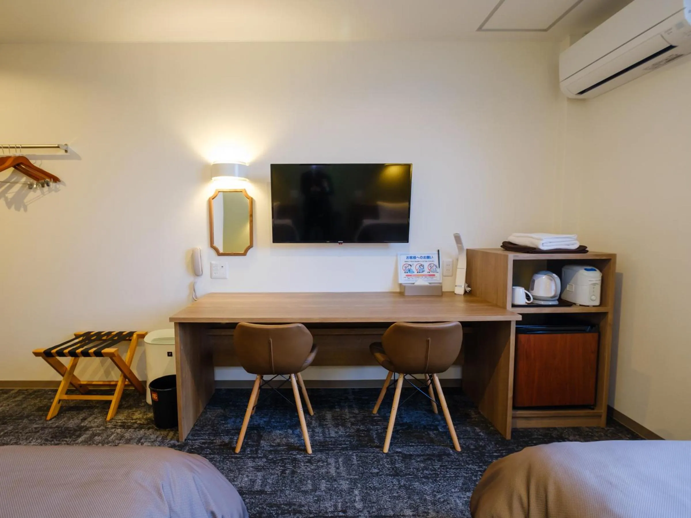 Photo of the whole room, Bed in 天然温泉 松山ニューグランドホテル