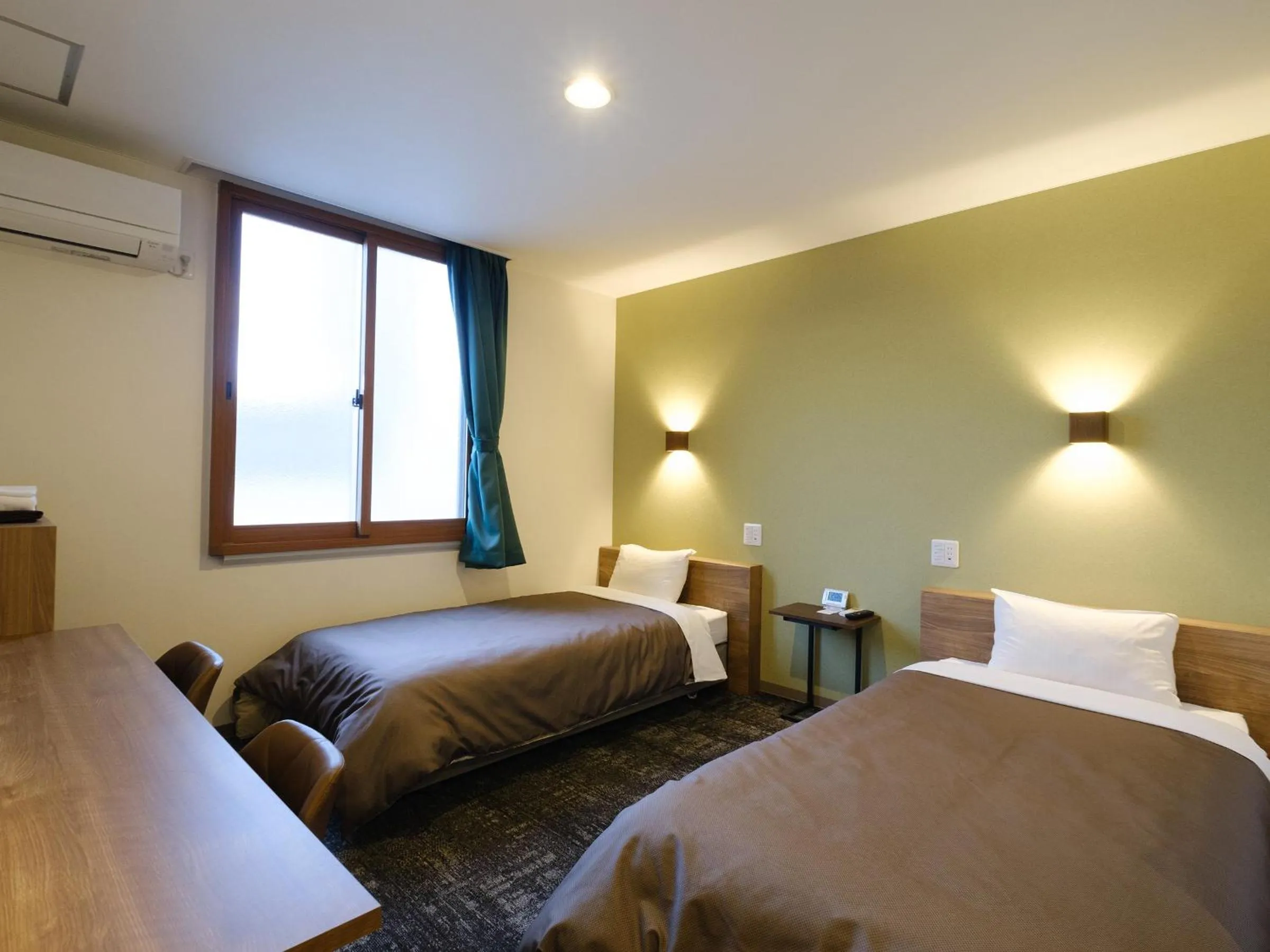 Photo of the whole room, Bed in 天然温泉 松山ニューグランドホテル