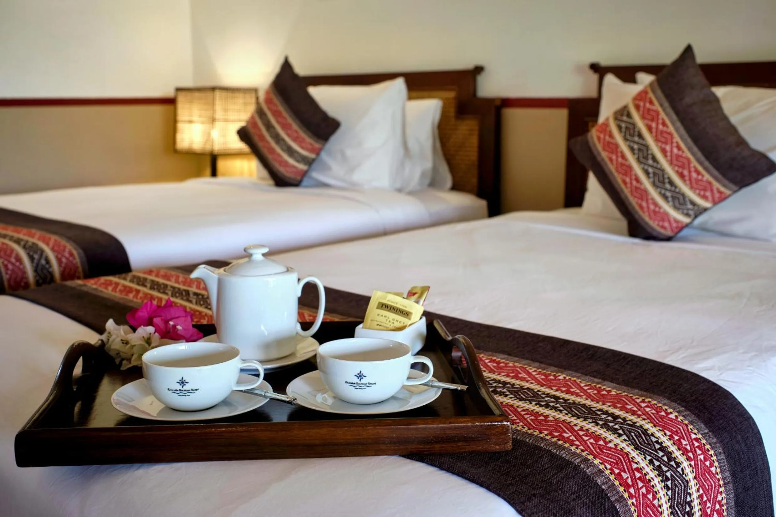 Bed in Riverside Boutique Resort, Vang Vieng