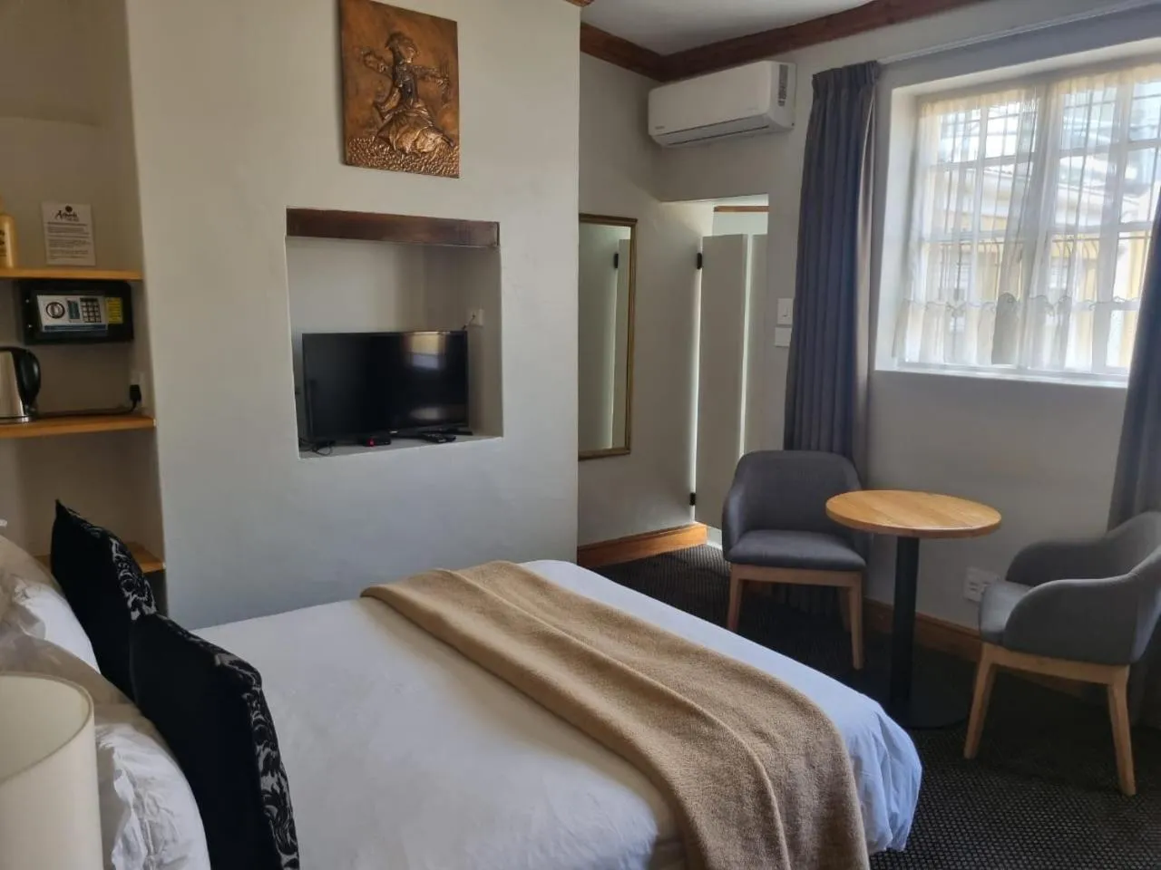 Bed in Ashanti Gardens Guesthouse