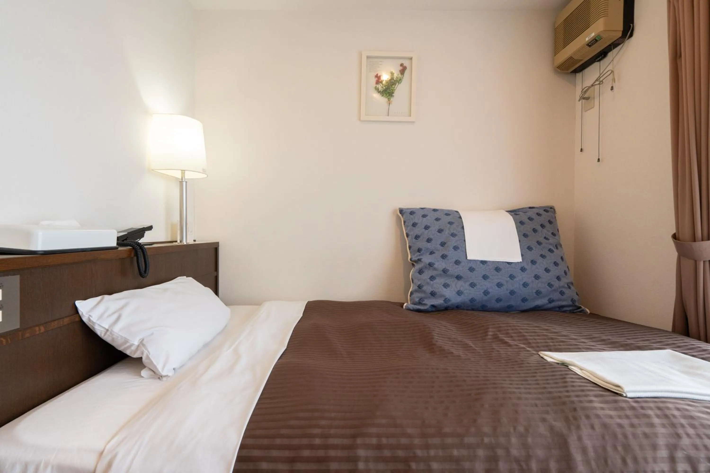 Bed in Sapporo Clark Hotel