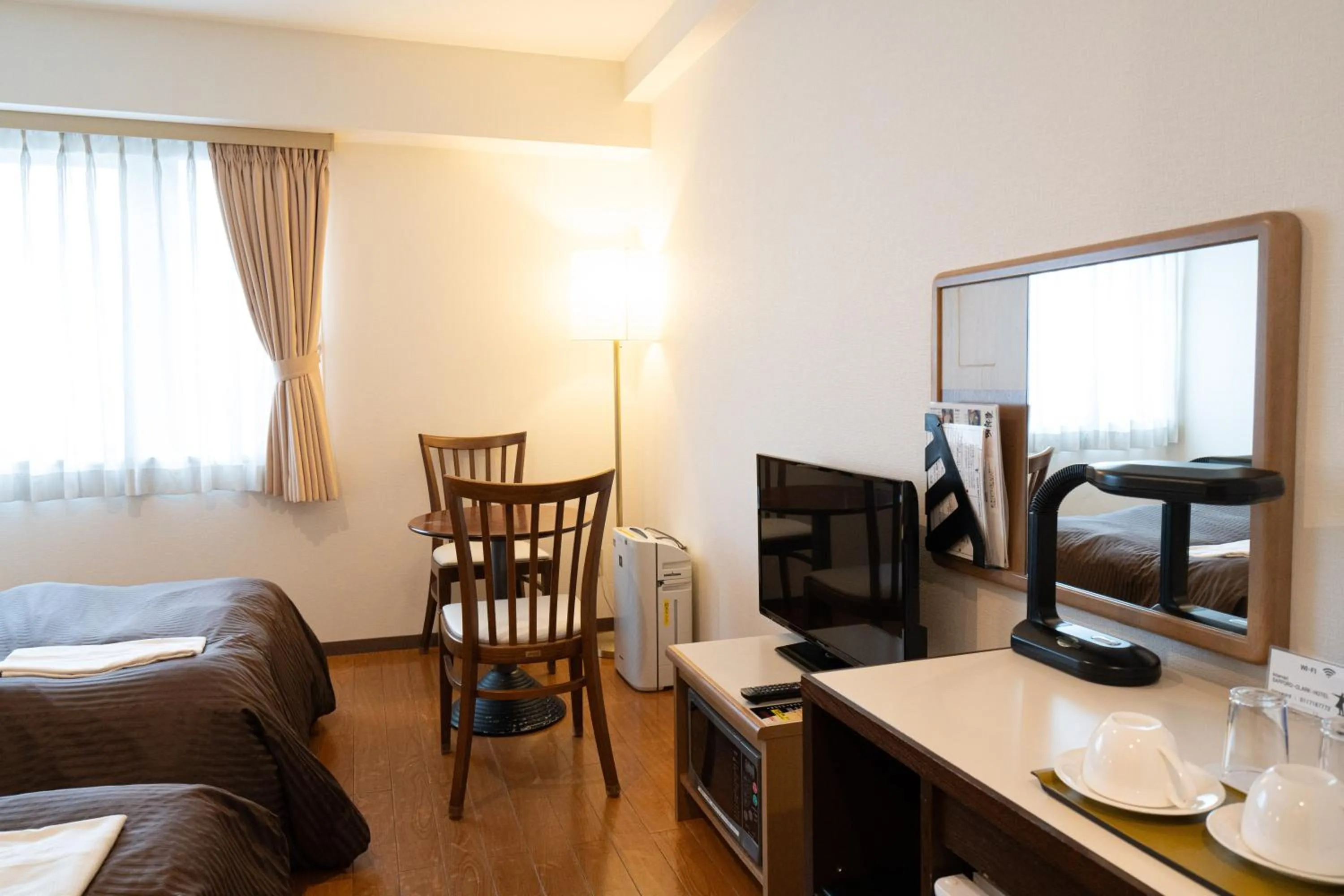 Photo of the whole room, Bed in Sapporo Clark Hotel