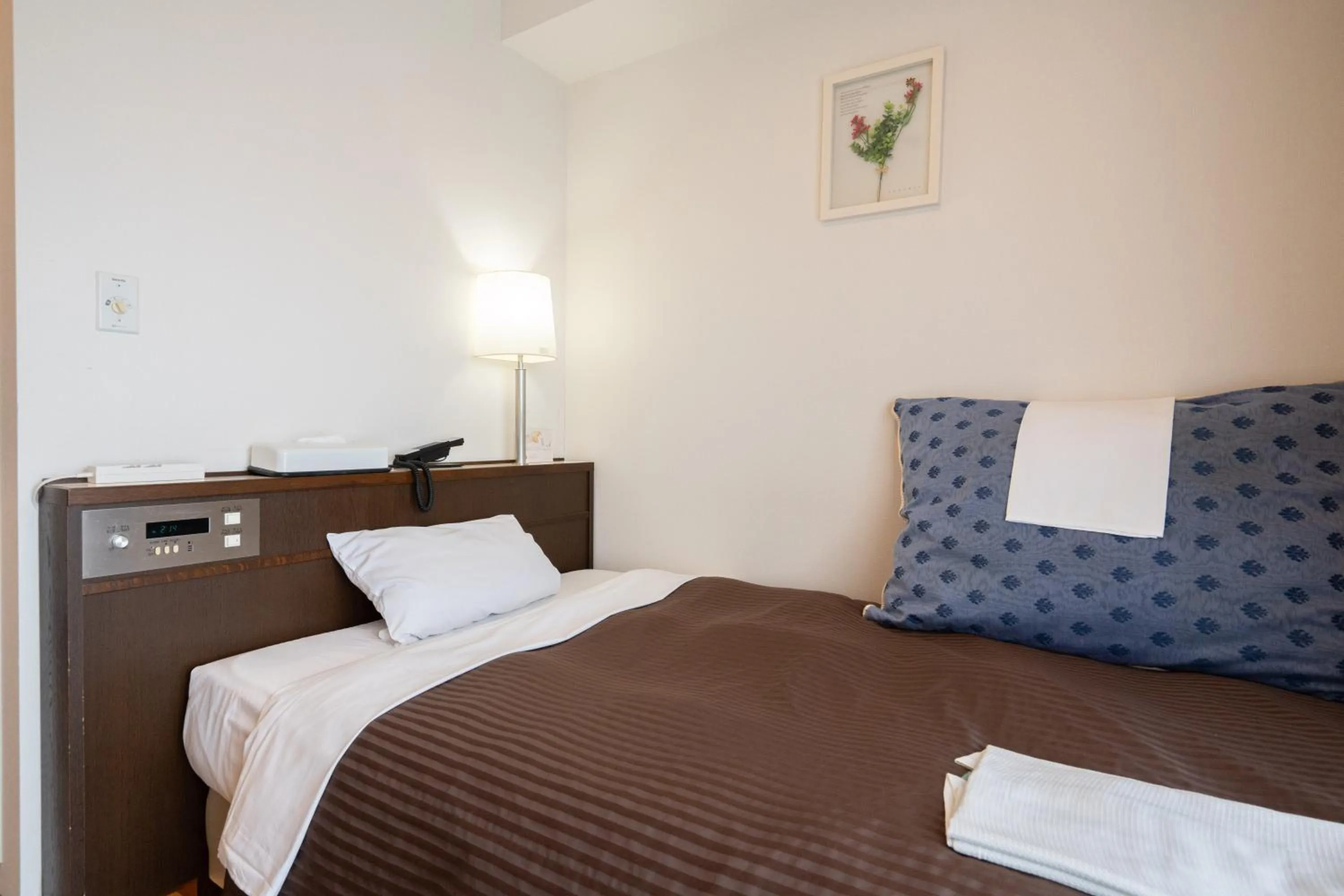 Bed in Sapporo Clark Hotel