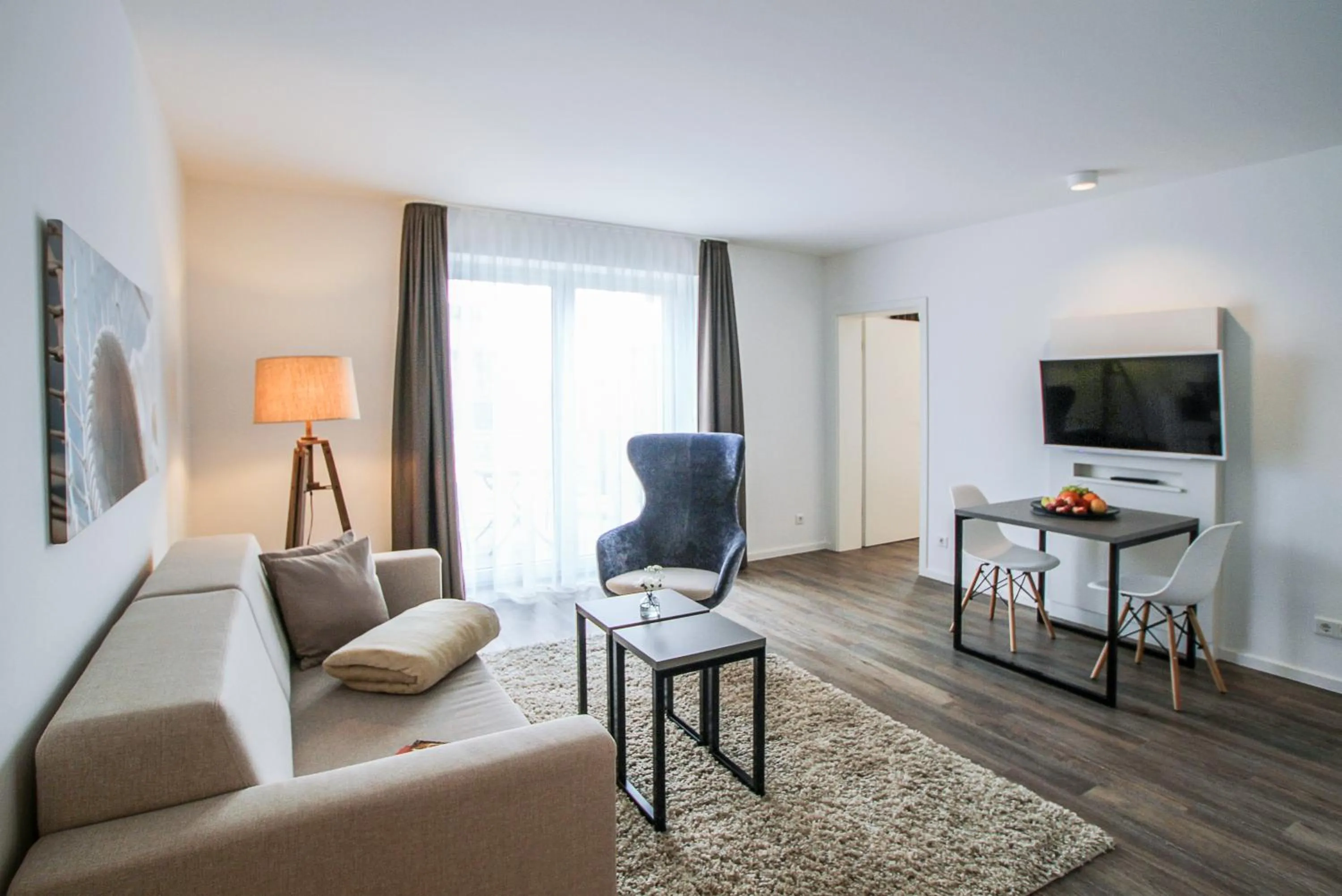 Communal lounge/ TV room in Appartements an der Golfanlage