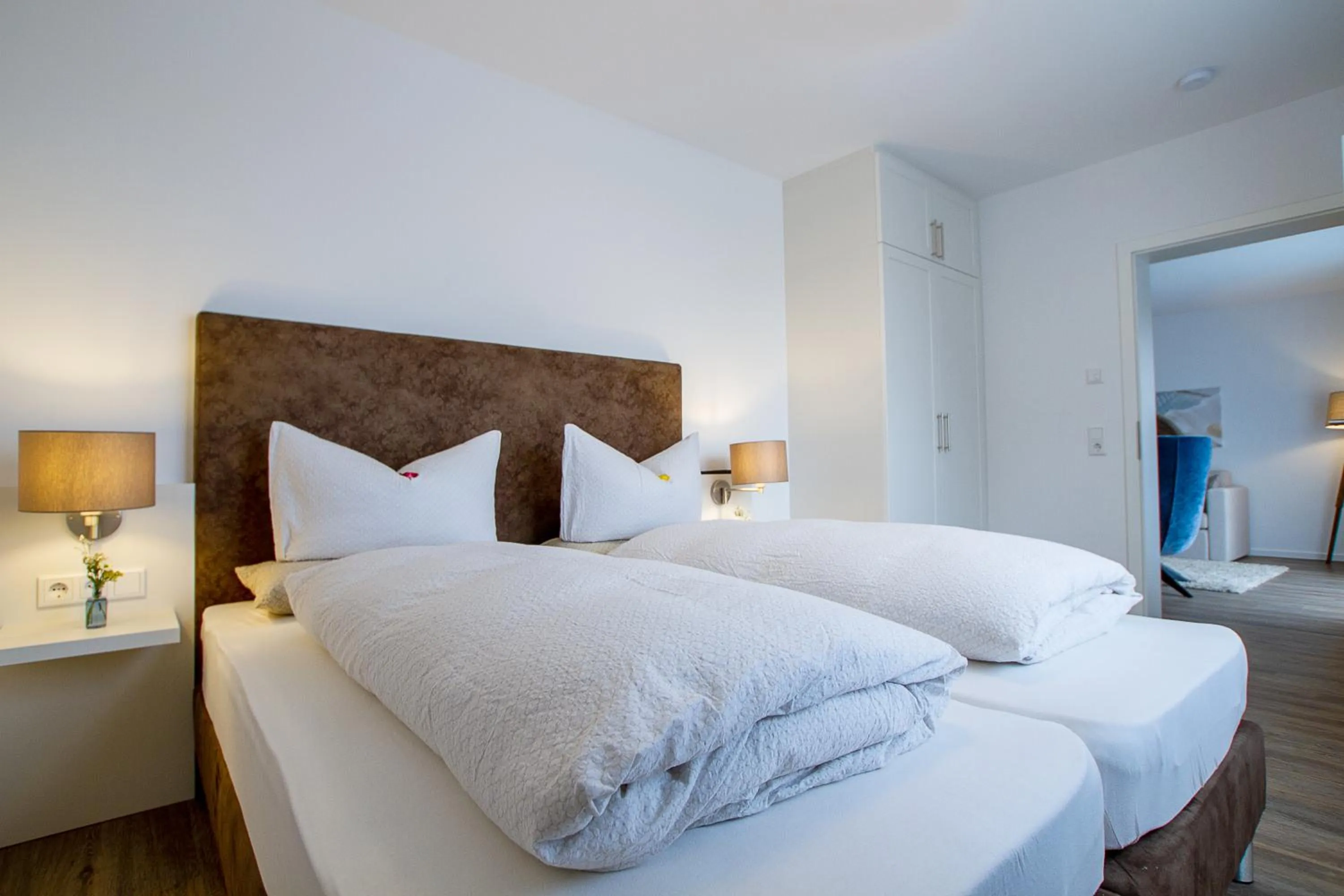 Bed in Appartements an der Golfanlage