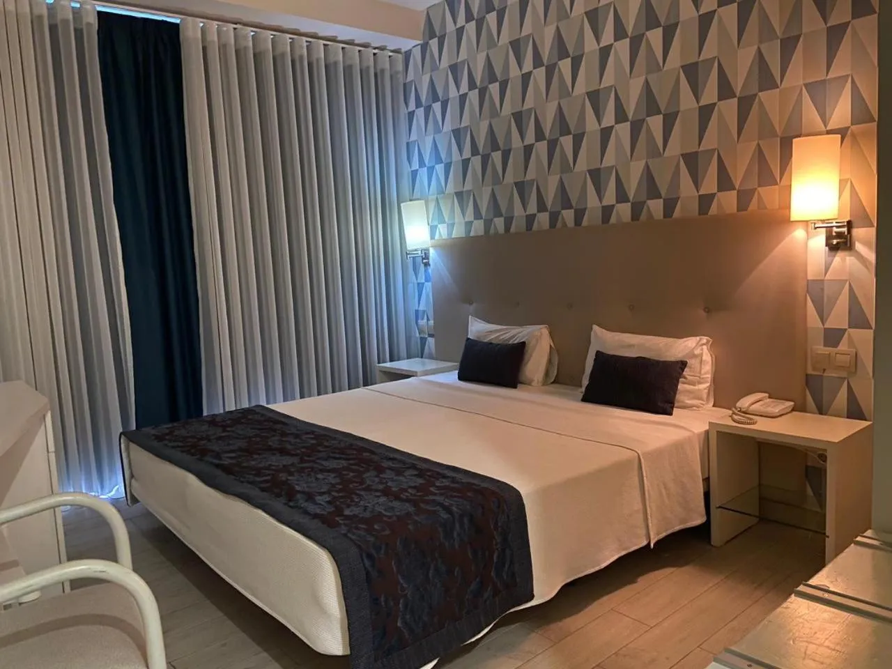 Bed in Ouril Hotel Julia