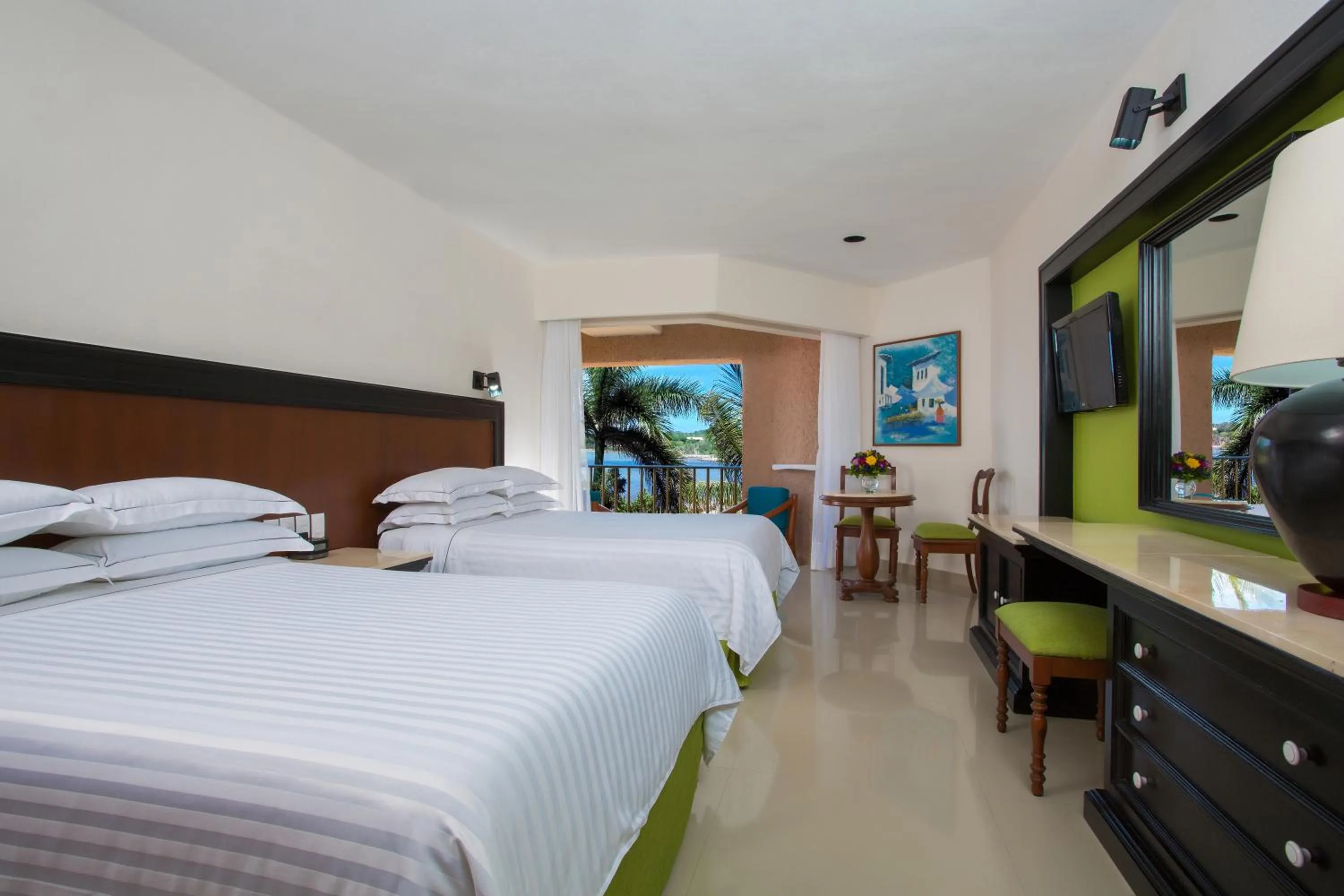 Photo of the whole room, Bed in Barceló Huatulco - All Inclusive