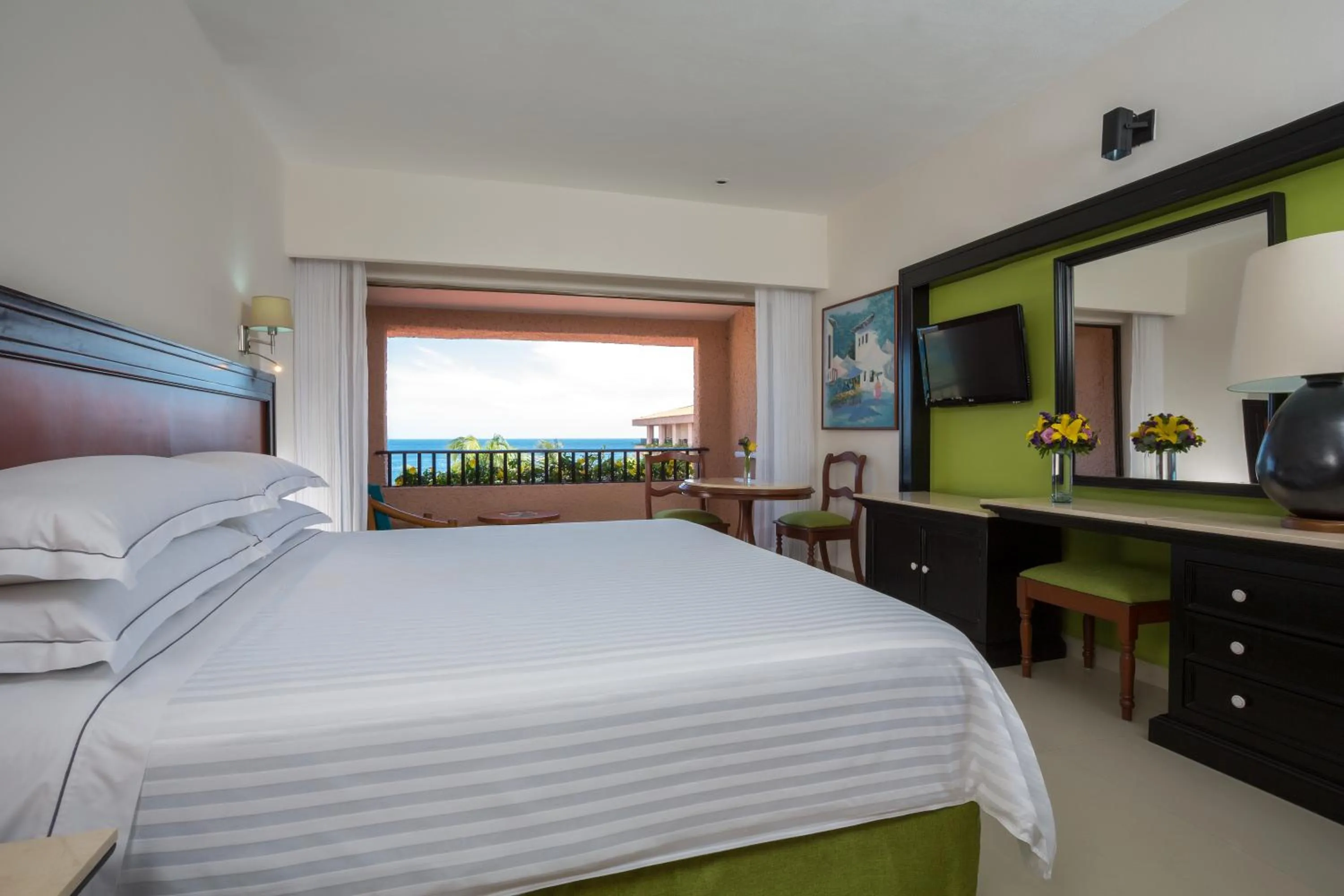 Photo of the whole room, Bed in Barceló Huatulco - All Inclusive