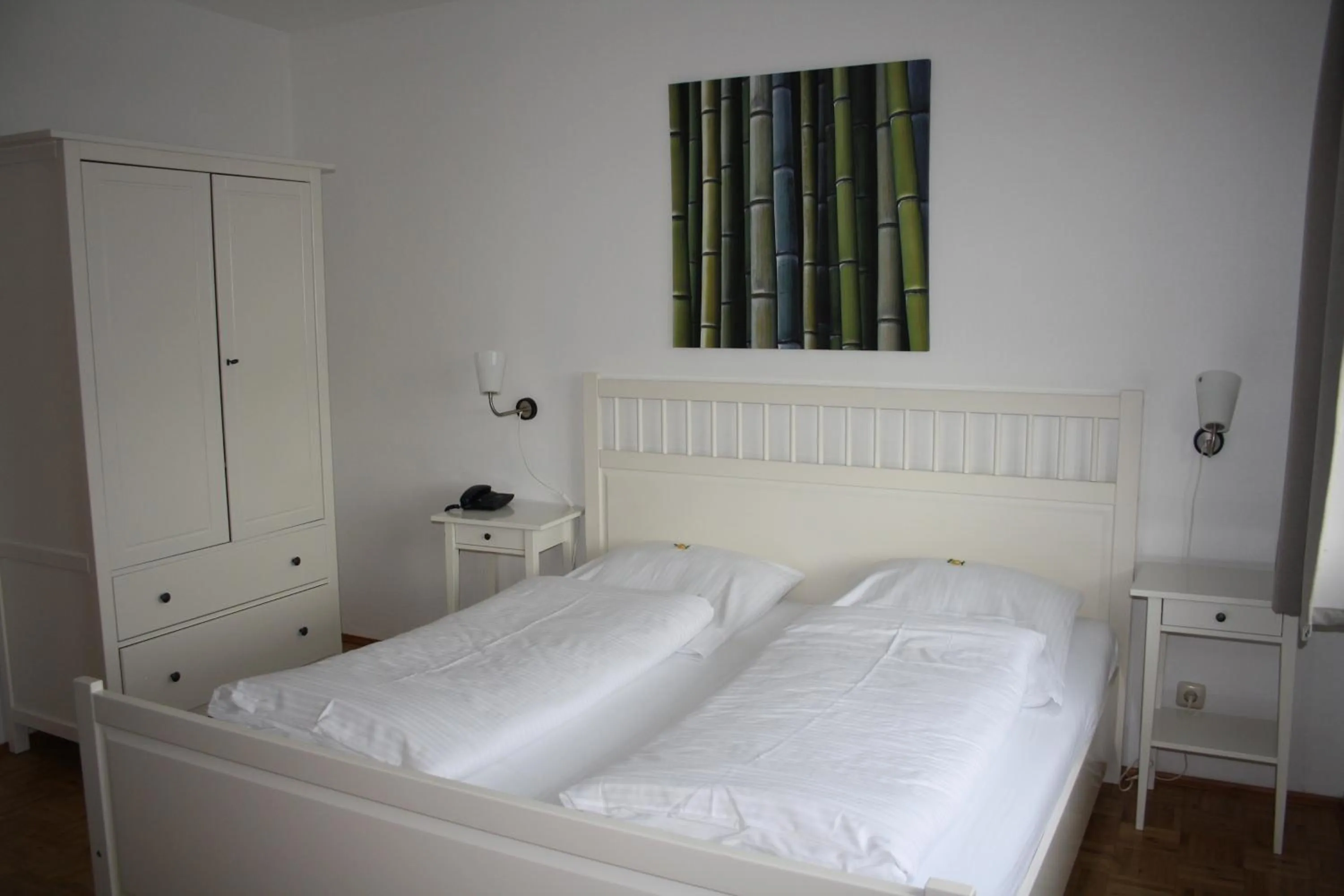 Bed in Hotel Schwarzer Adler