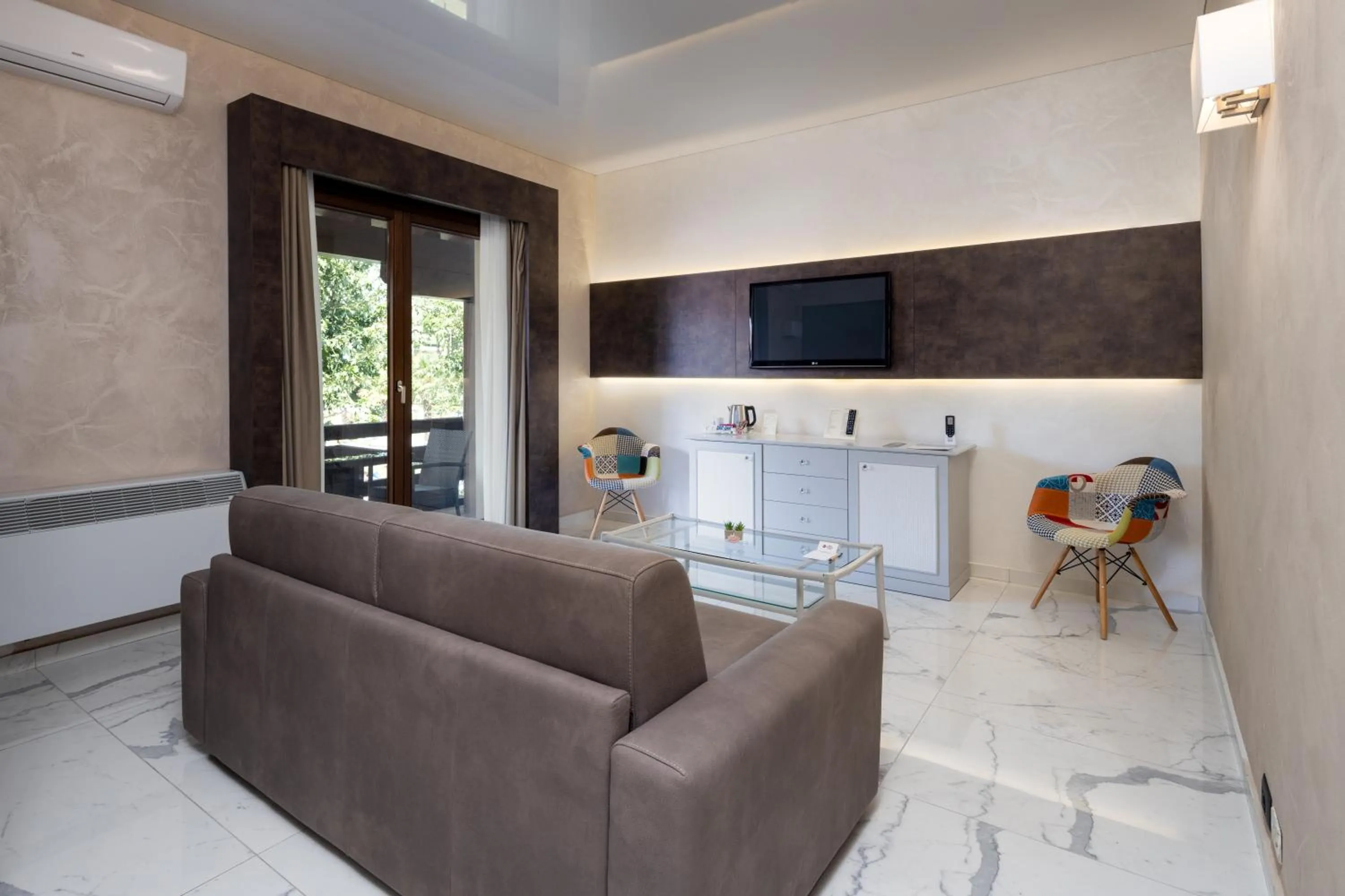 Living room in Best Western Plus Hotel Modena Resort