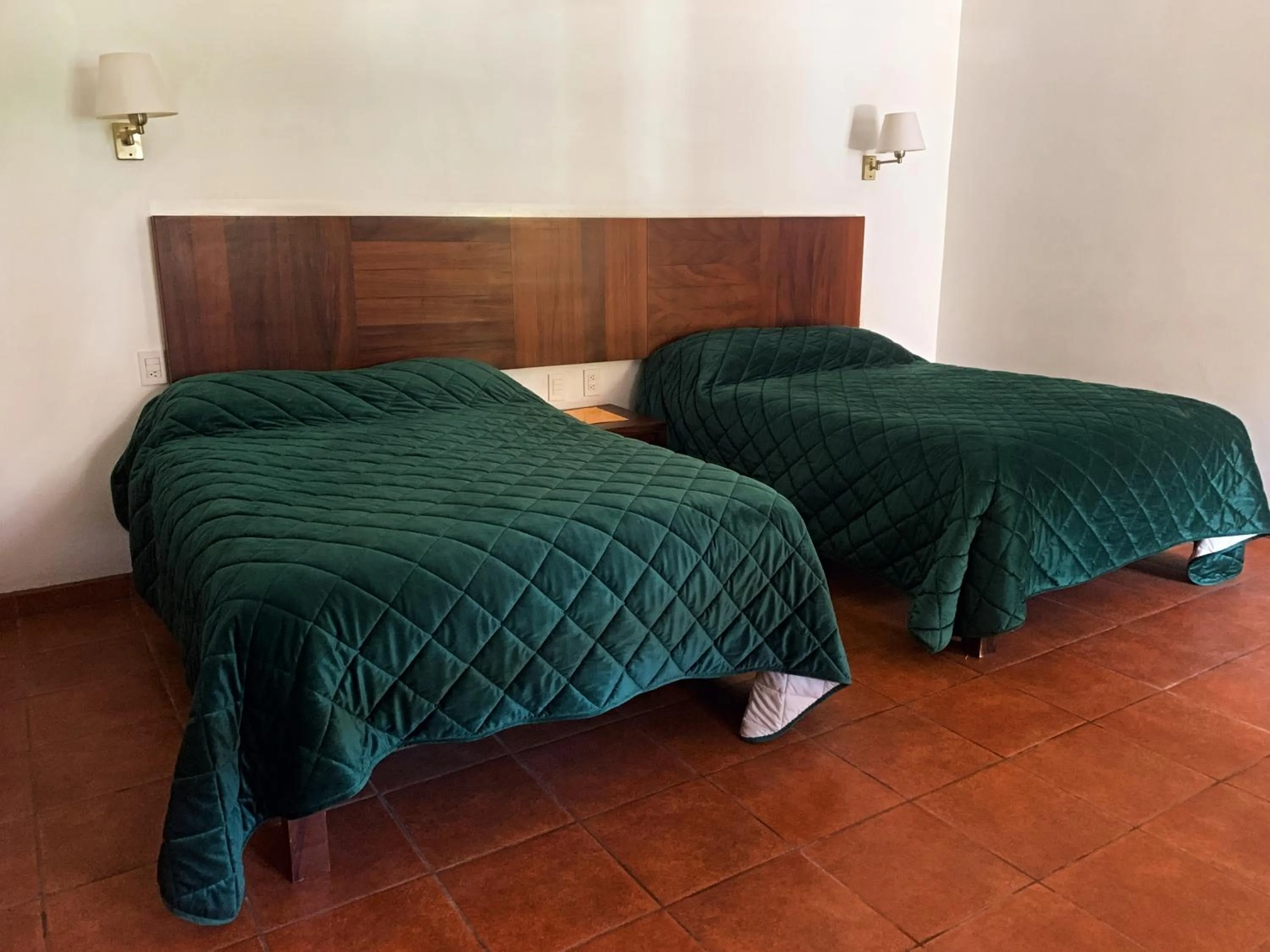 Bed in Hotel Posada Santa Rita