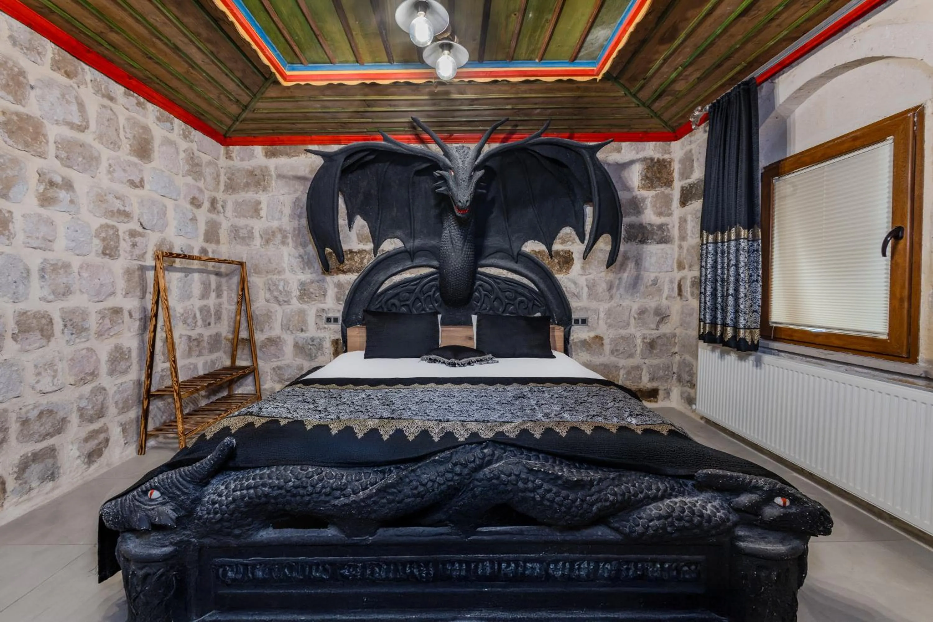 Bed in Kayatas Cave Suites