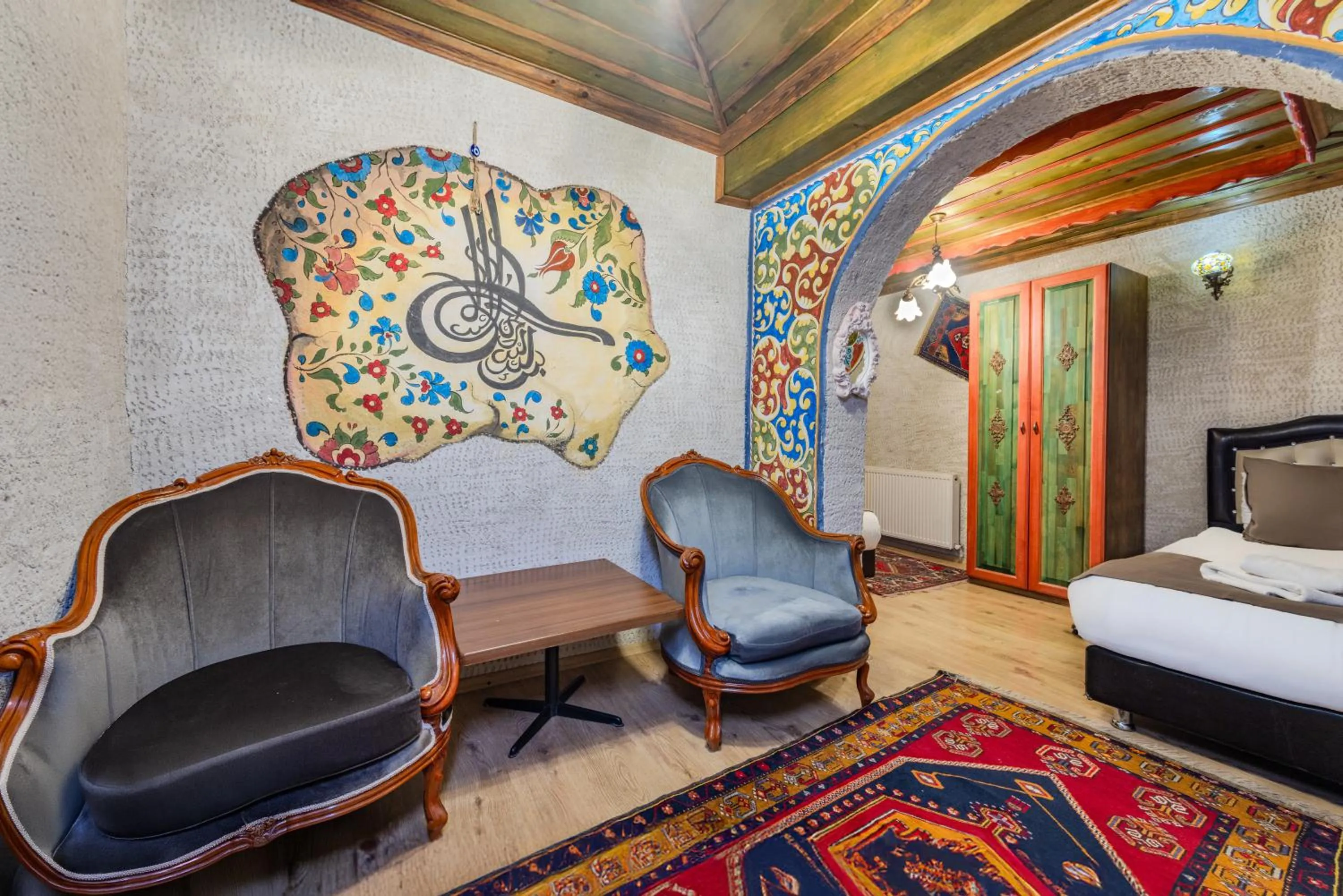 Bed in Kayatas Cave Suites