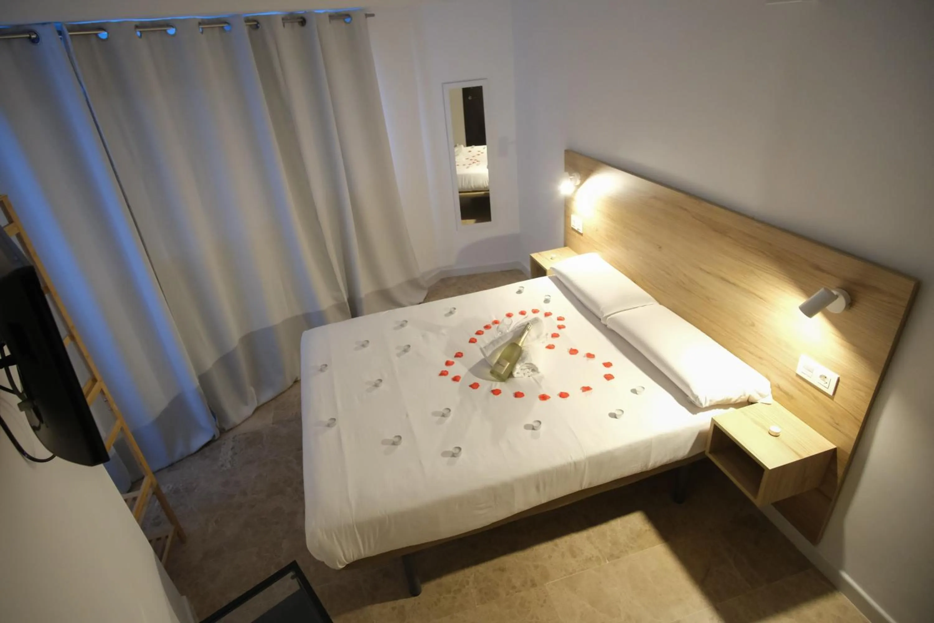 Bed in Urban Rooms Alicante