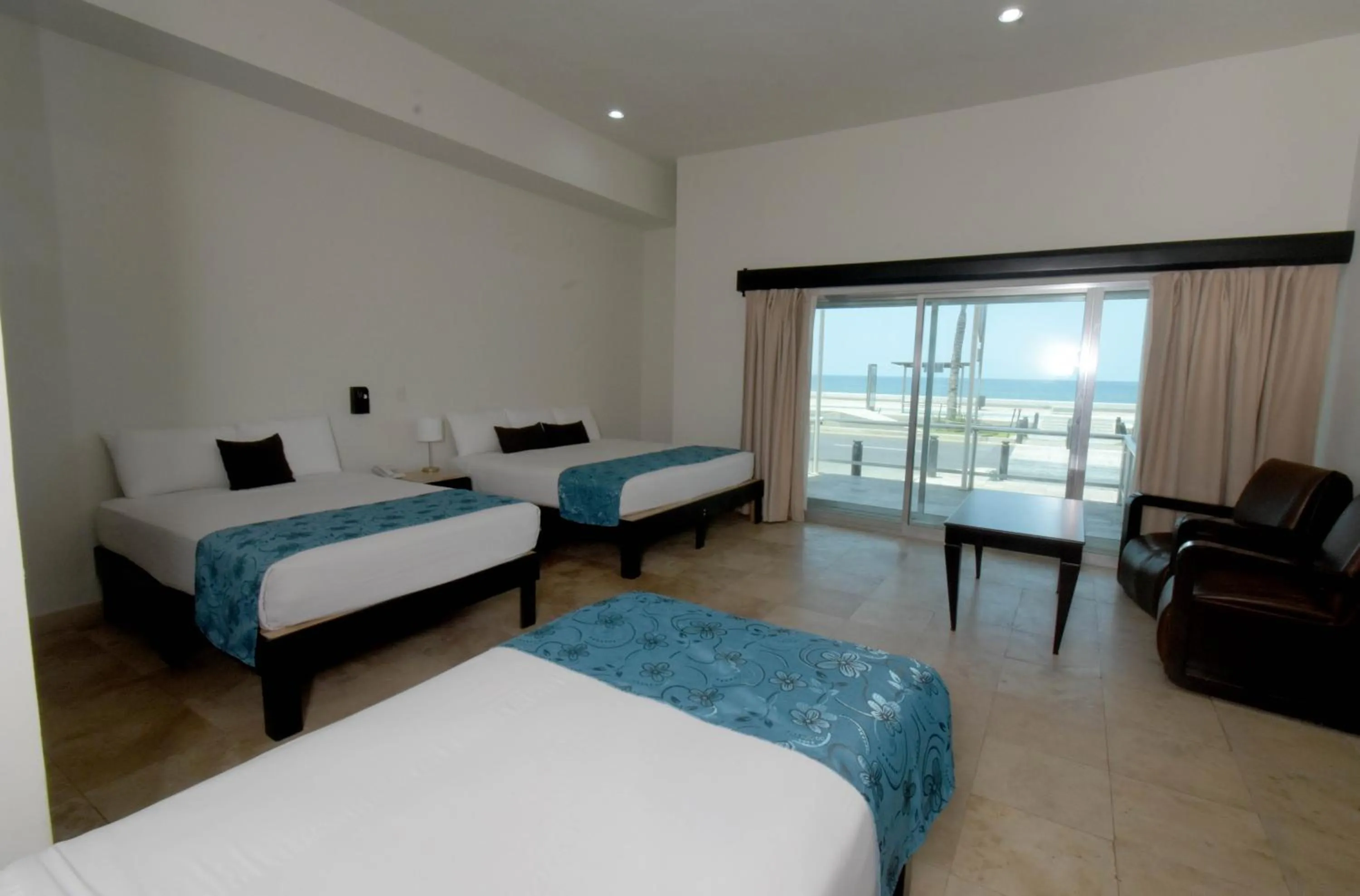 Photo of the whole room, Bed in Coral Island Beach View Hotel