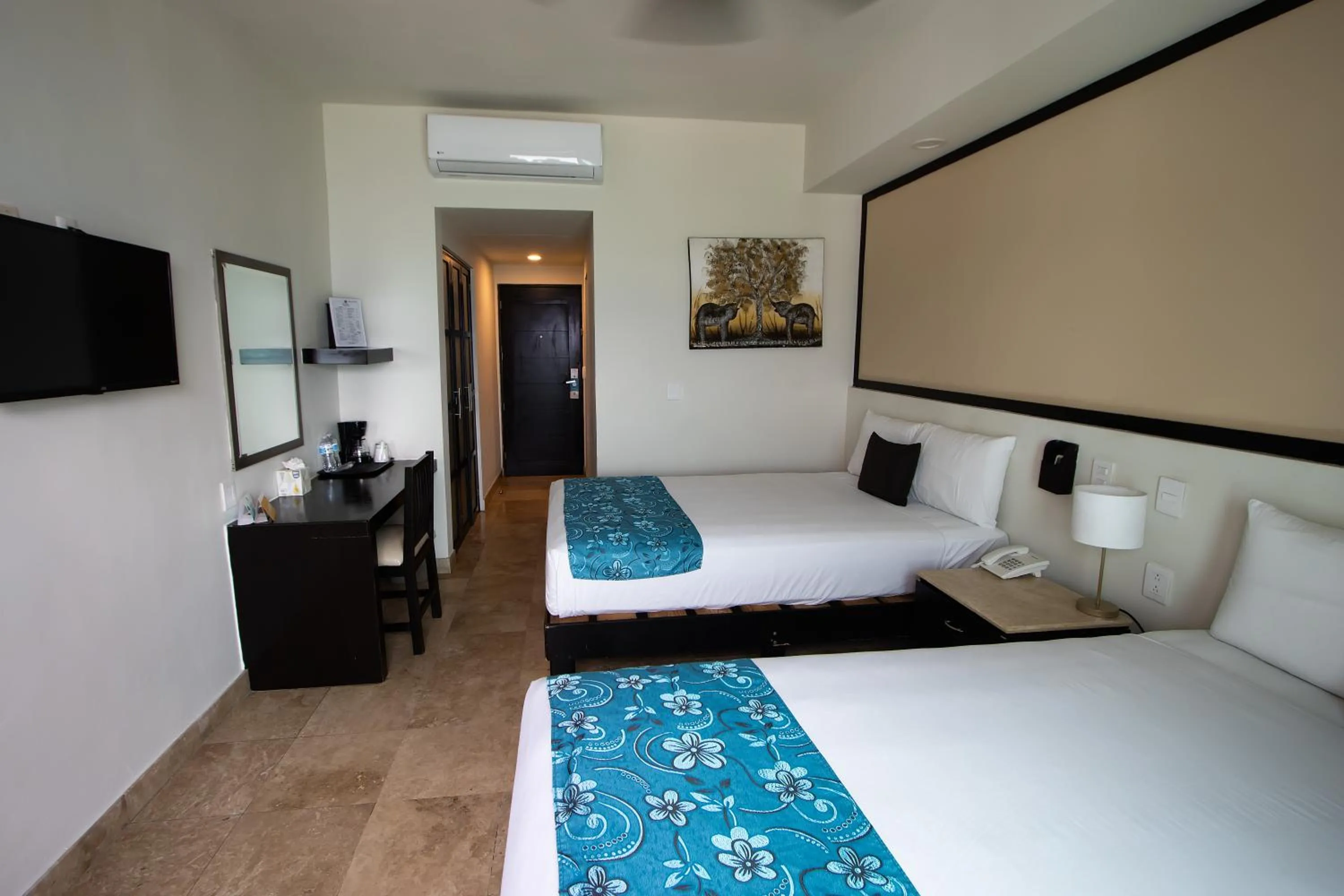 Bed in Coral Island Beach View Hotel