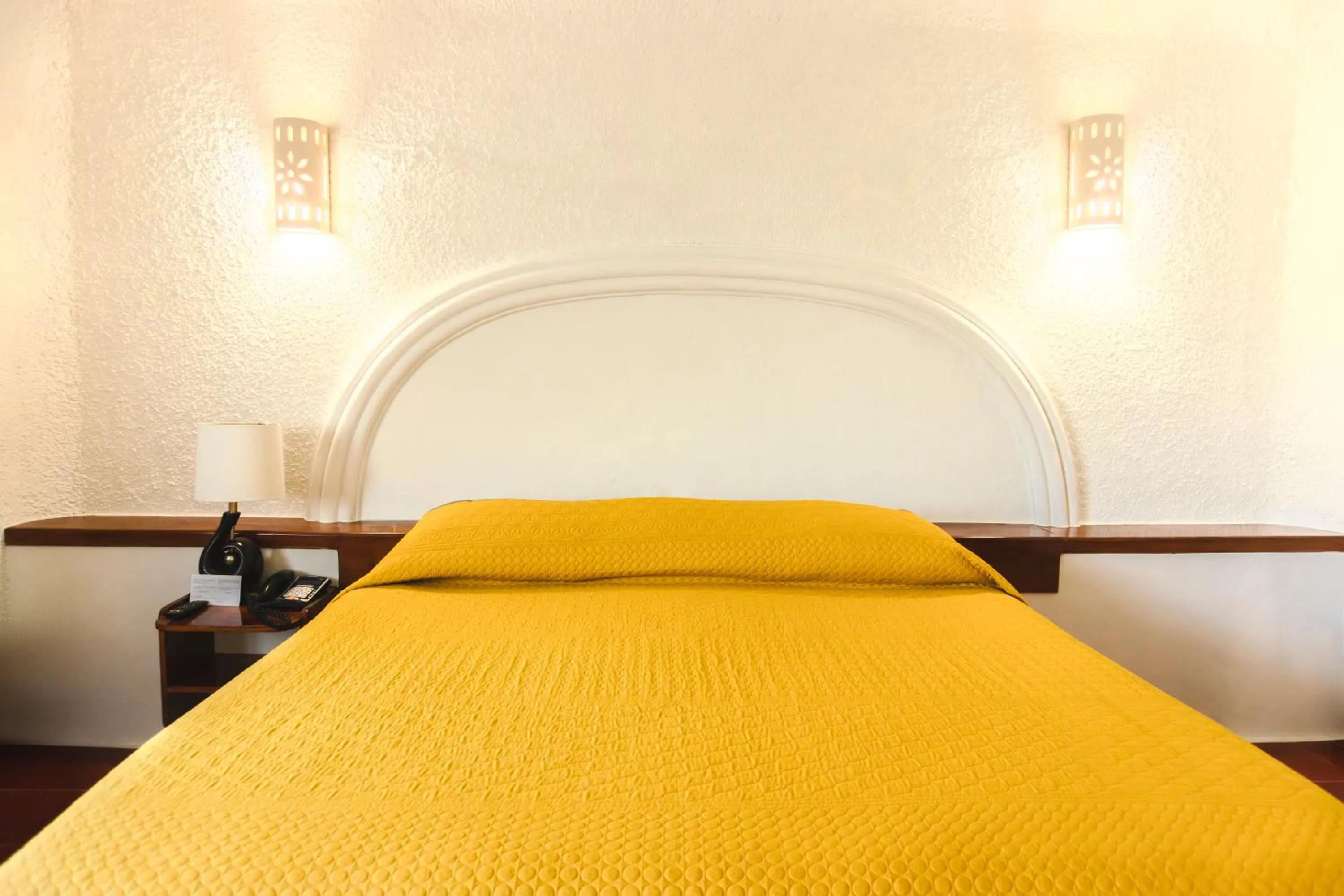 Bed in Hotel Antillano