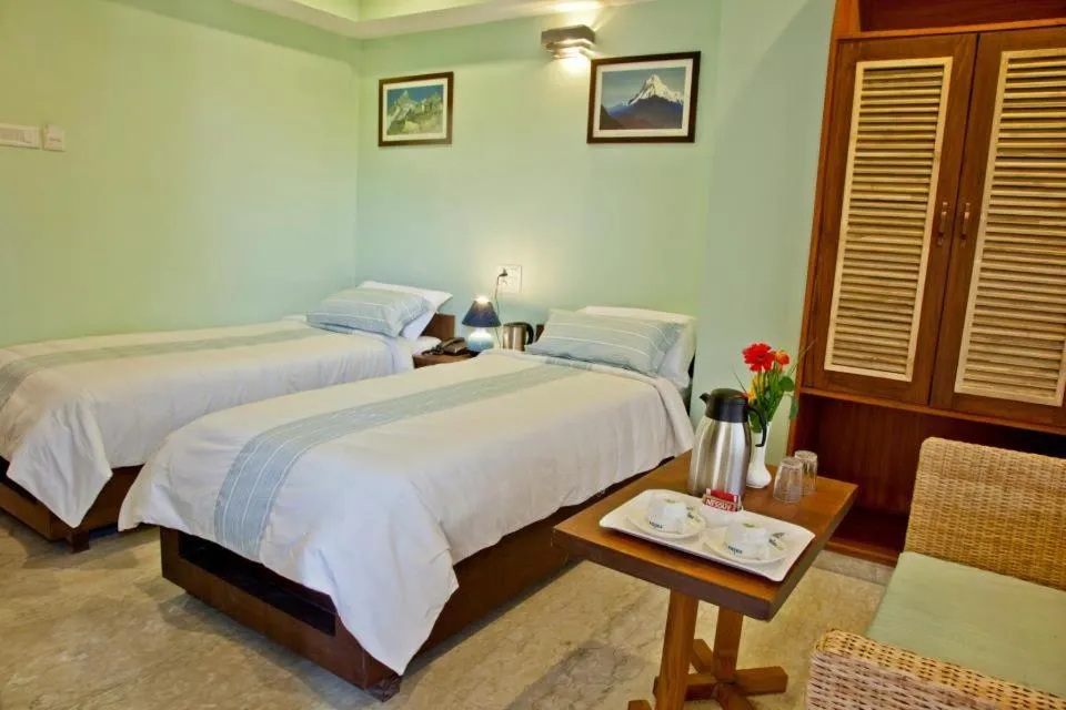 Bed in Hotel Rains Inn