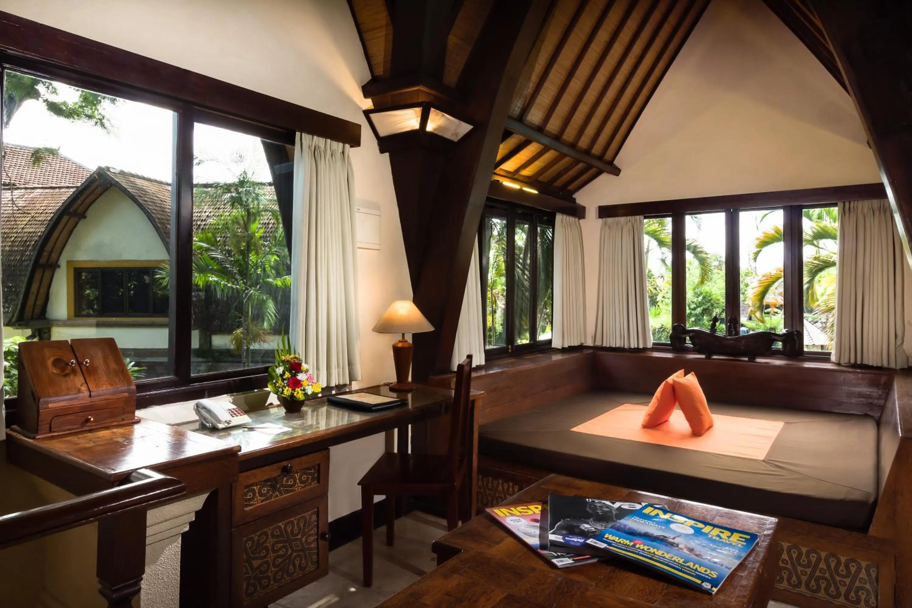 Seating area, Bed in Hotel Vila Lumbung