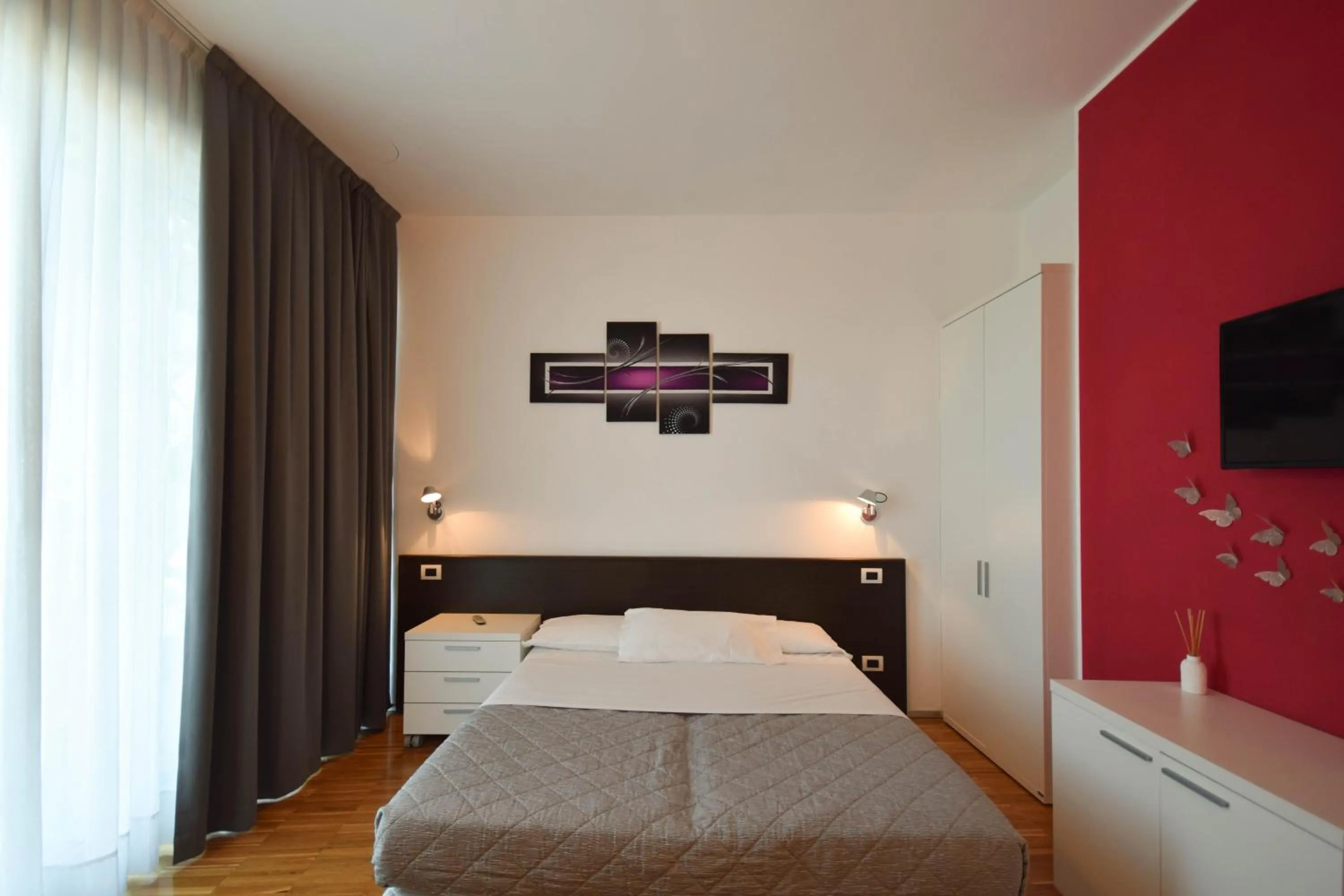 Bed in Hotel Mantova Residence