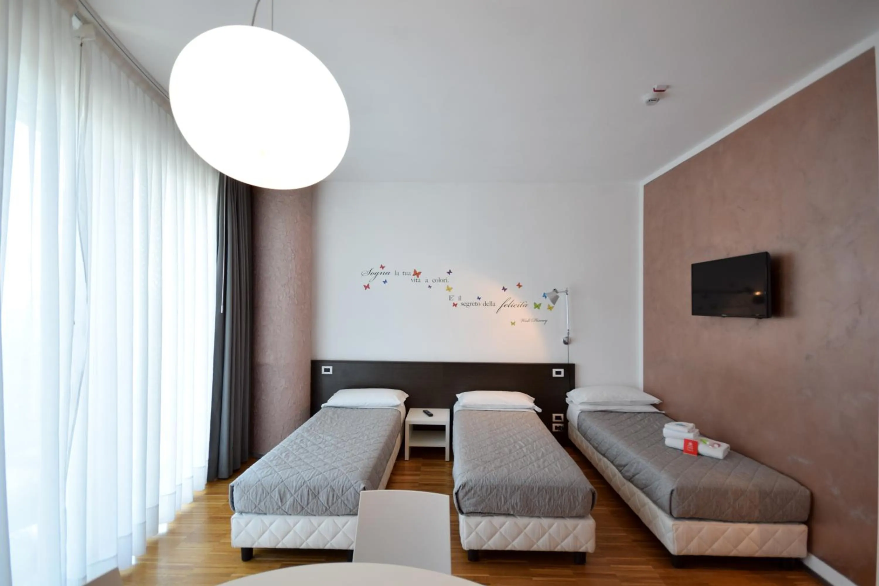 Bed in Hotel Mantova Residence