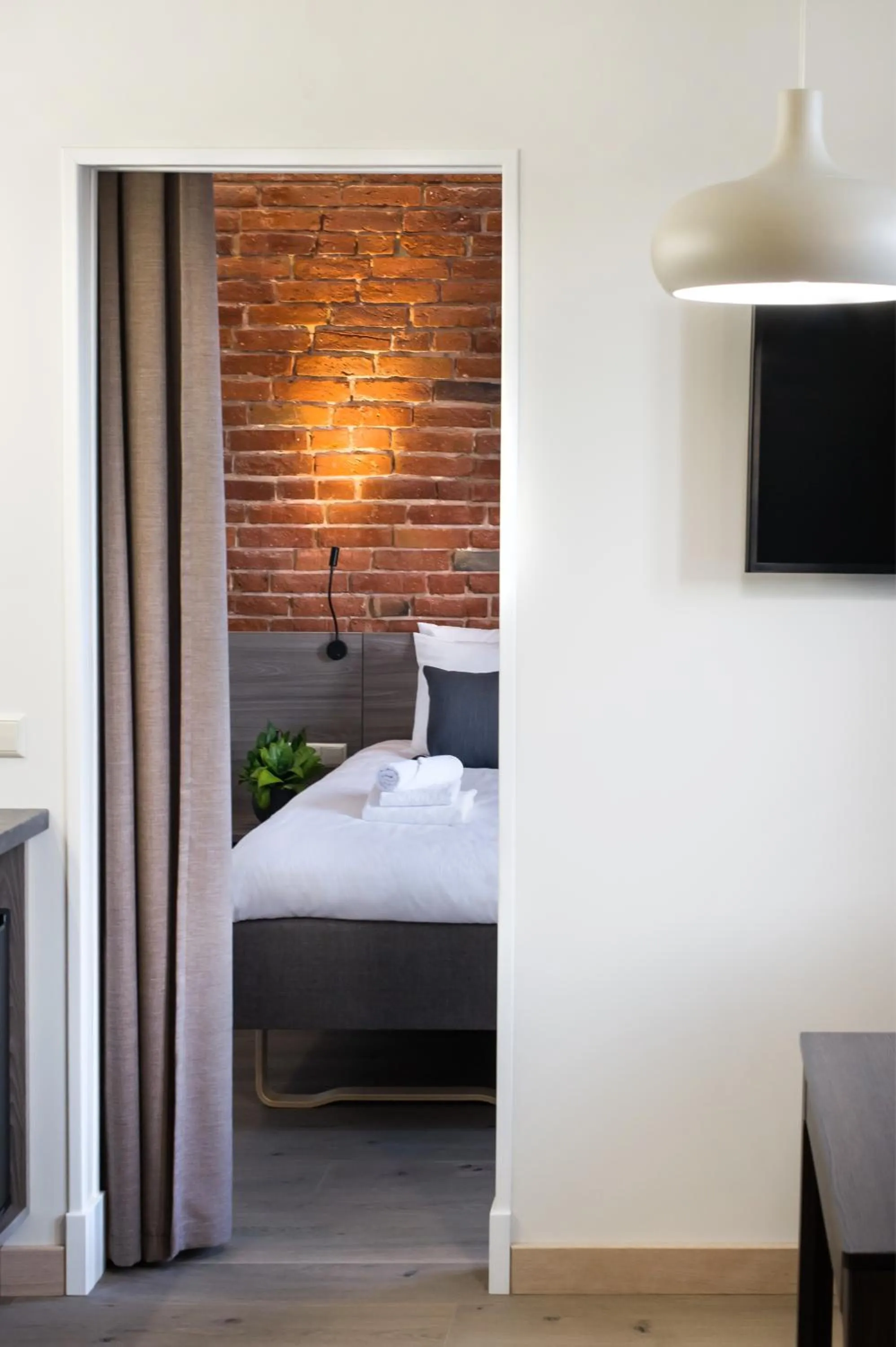 TV and multimedia, Bed in Dangė Hotel