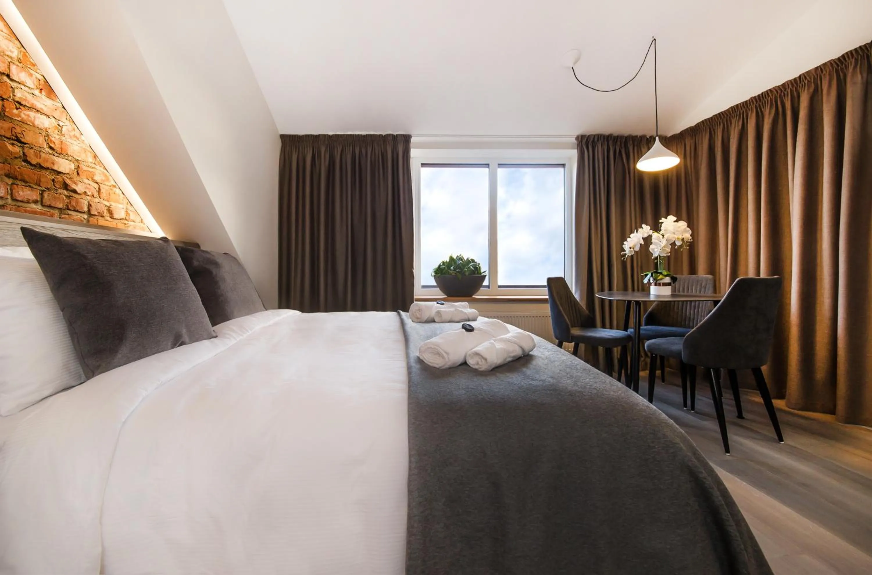 Living room, Bed in Dangė Hotel