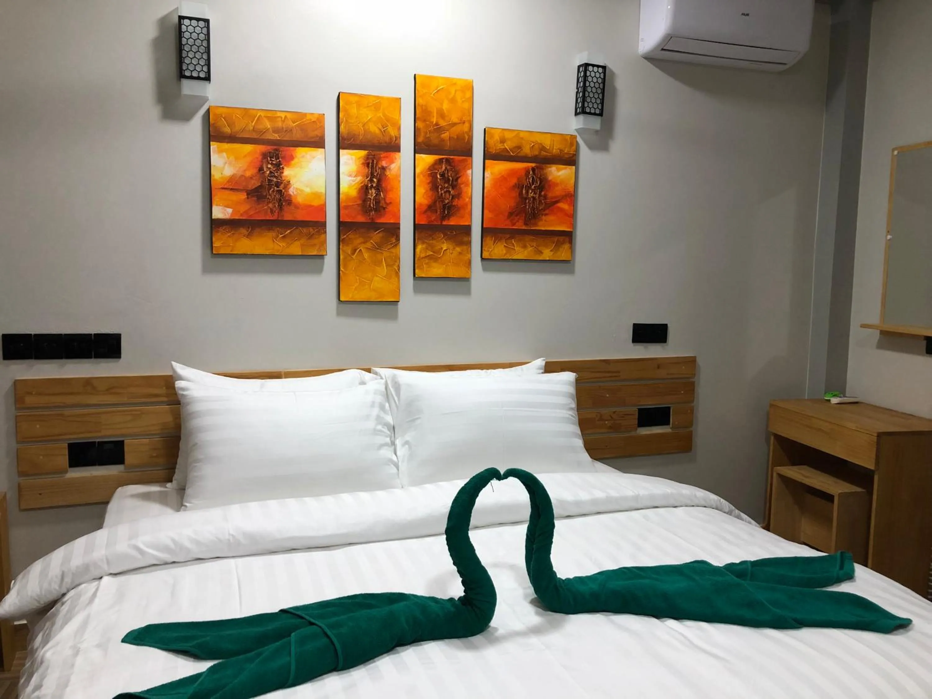 Bed in IRIS Beach Residence