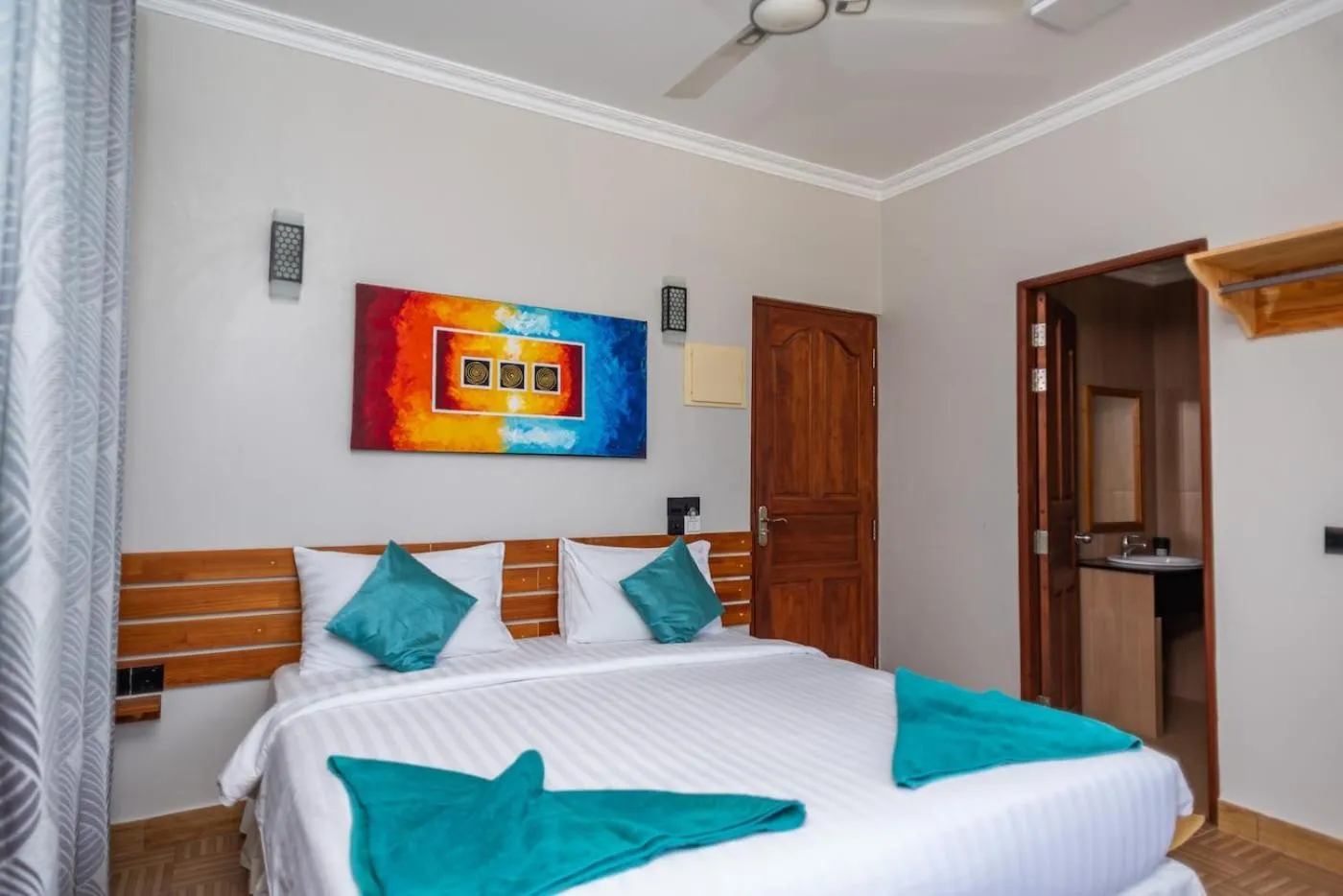 Bed in IRIS Beach Residence