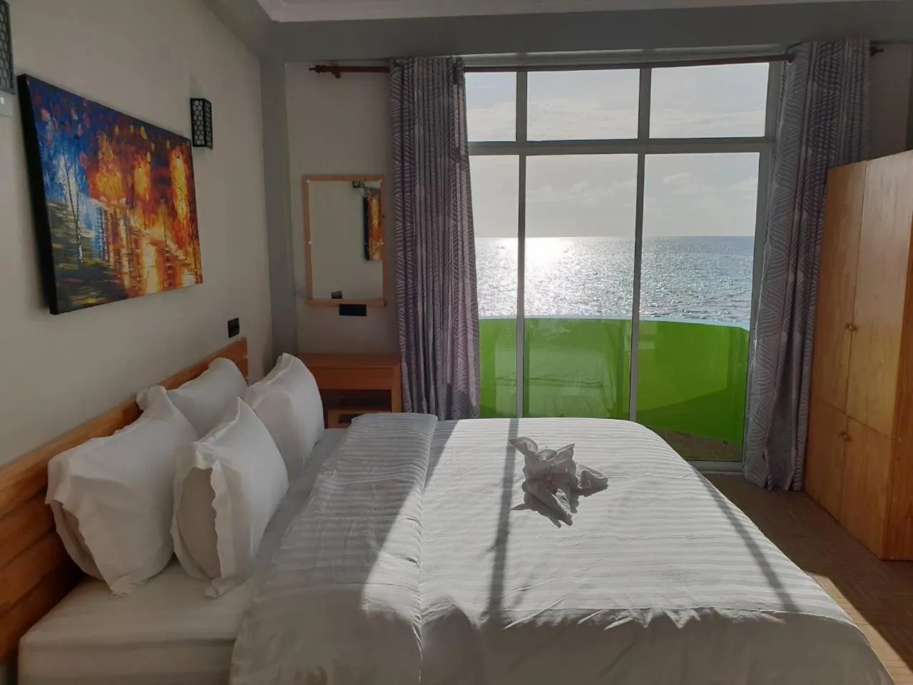 Bed in IRIS Beach Residence
