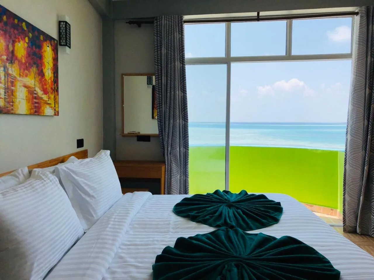 Bed in IRIS Beach Residence