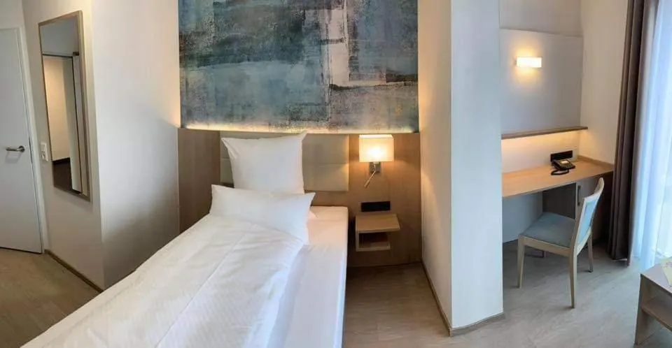 Bed in Thermalhotel Kemper