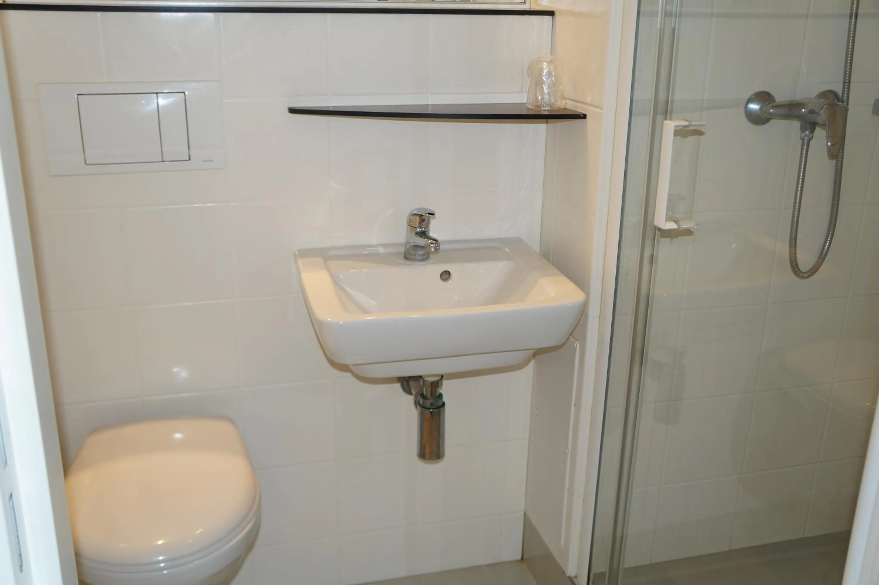 Bathroom in Premiere Classe Sens Nord- Saint Clément