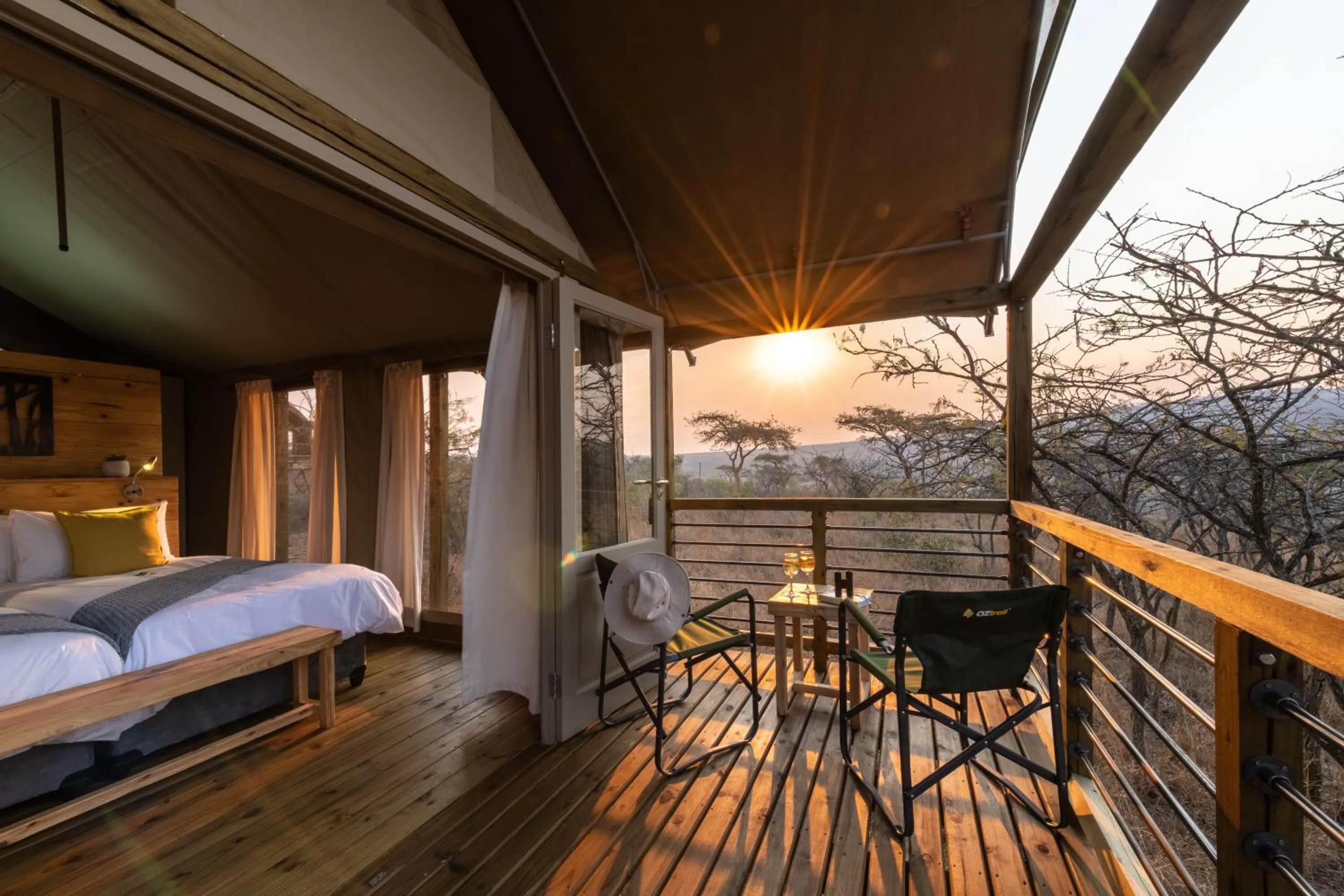 Seating area, Bed in Ndhula Luxury Tented Lodge