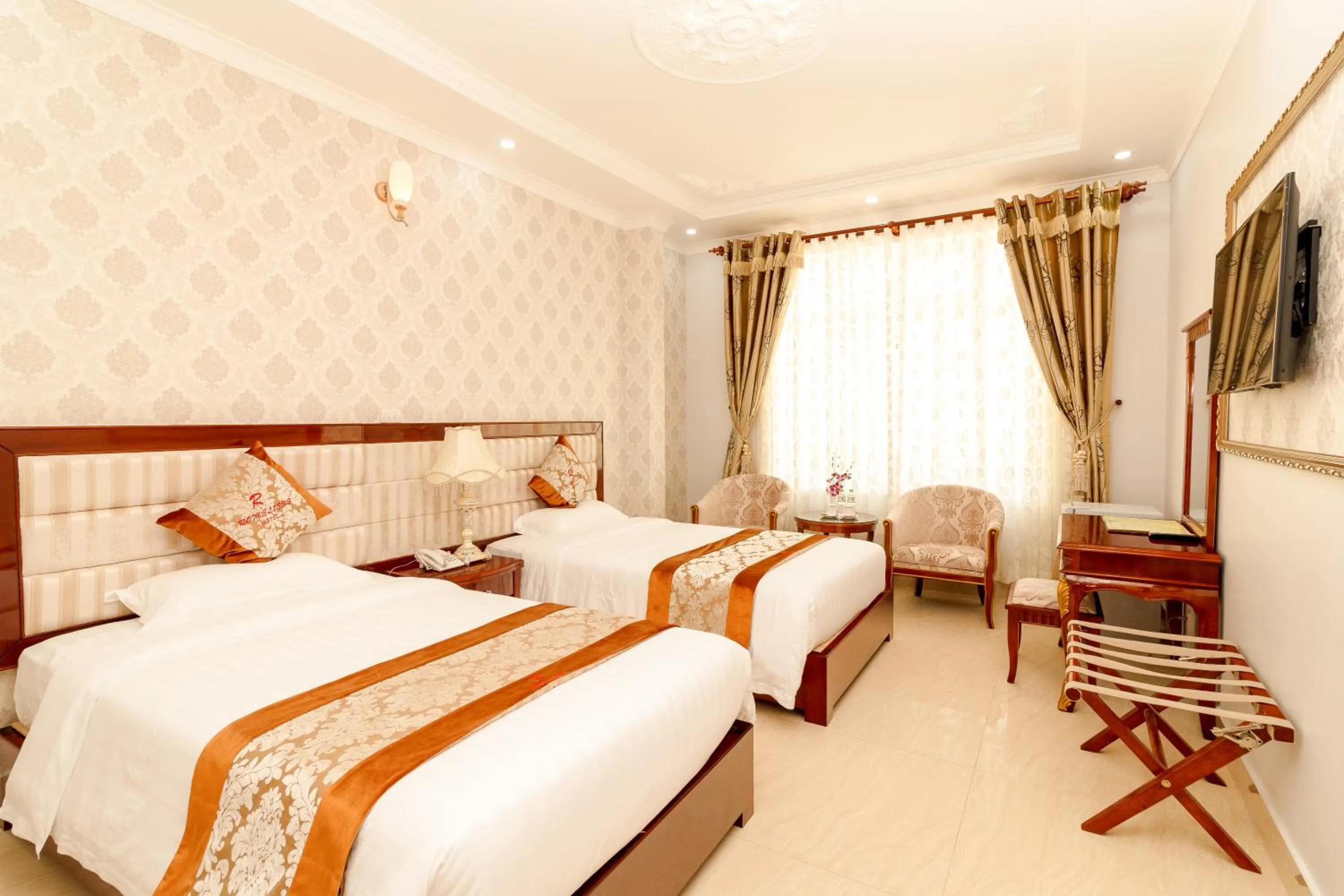 Bed in Romeliess Hotel