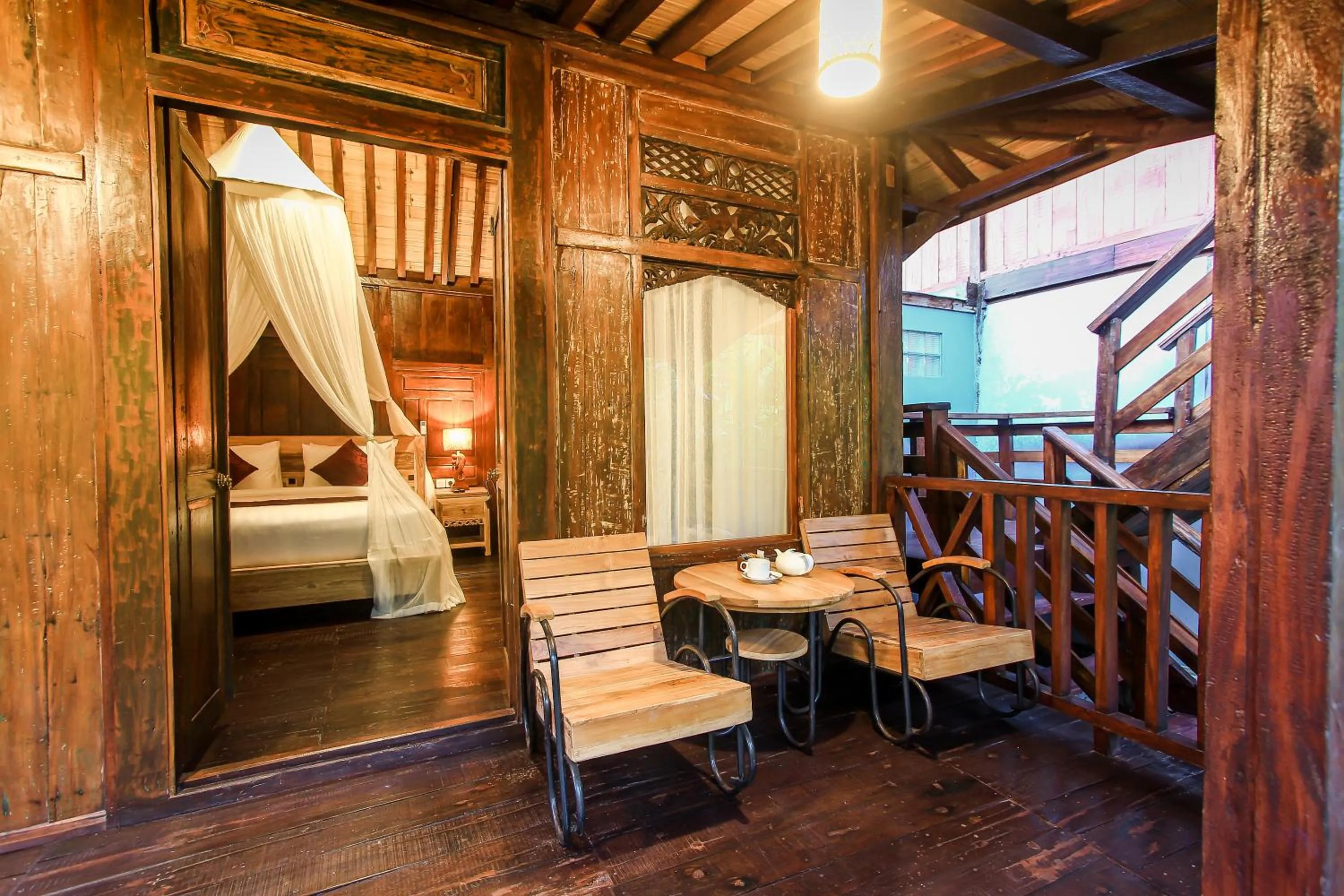 Balcony/Terrace, Bed in Keramas Sacred River Retreat Resort and Villa