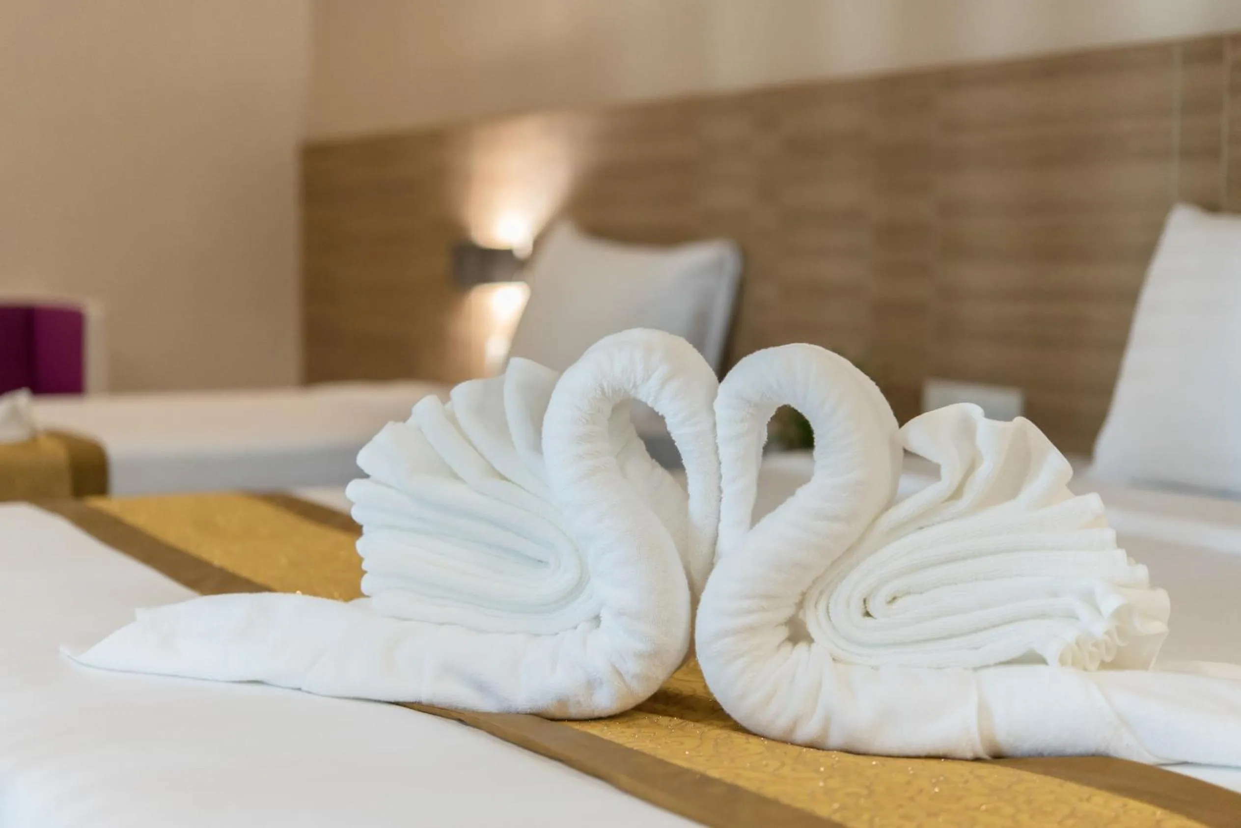 Bed in Paragon Grand Resort