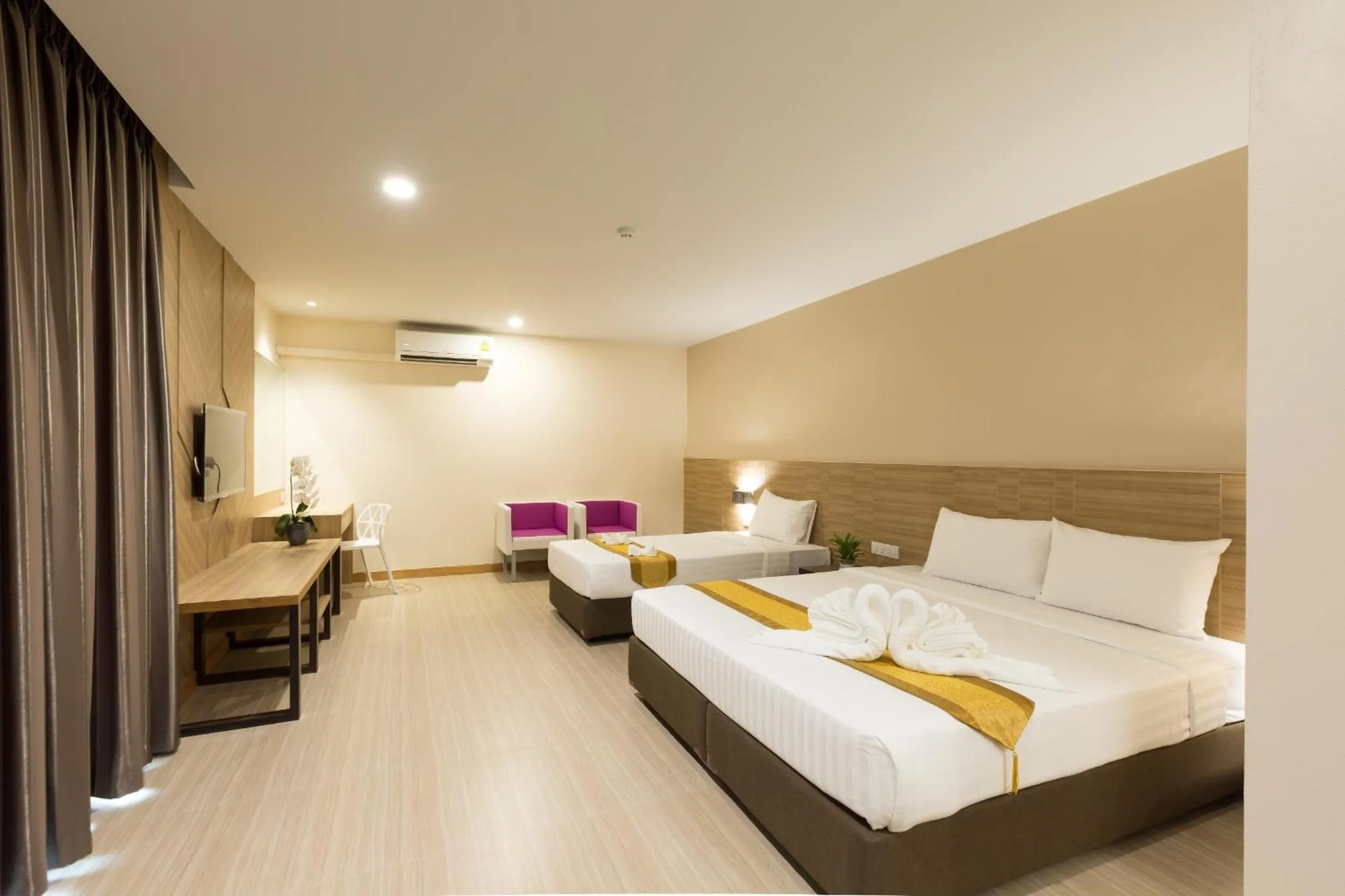 Bed in Paragon Grand Resort