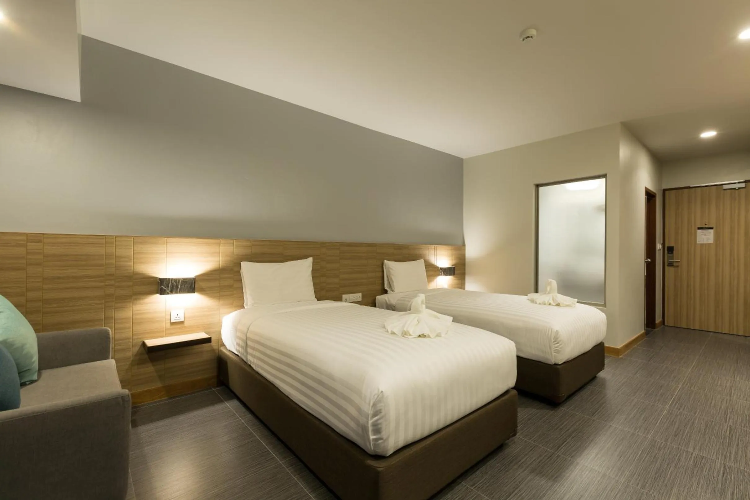 Bed in Paragon Grand Resort