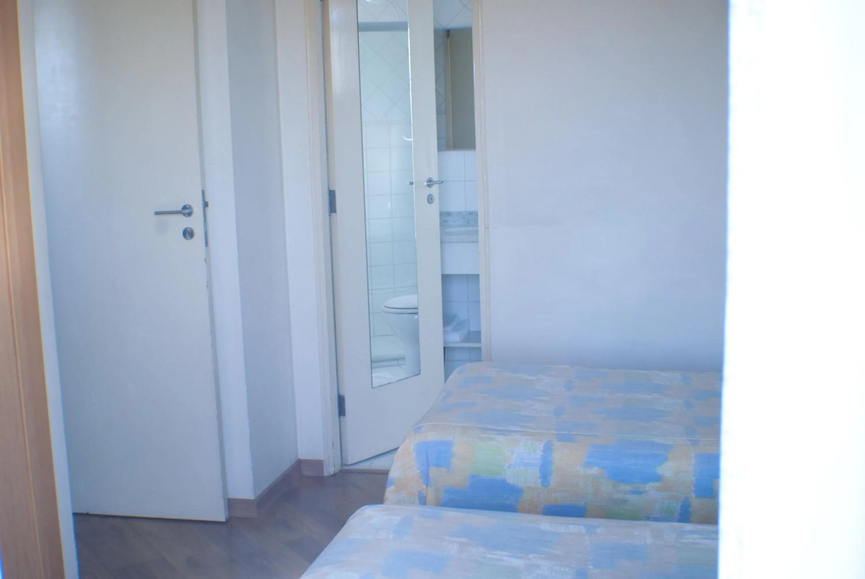 Bed in Residencial Bella Vista Suites