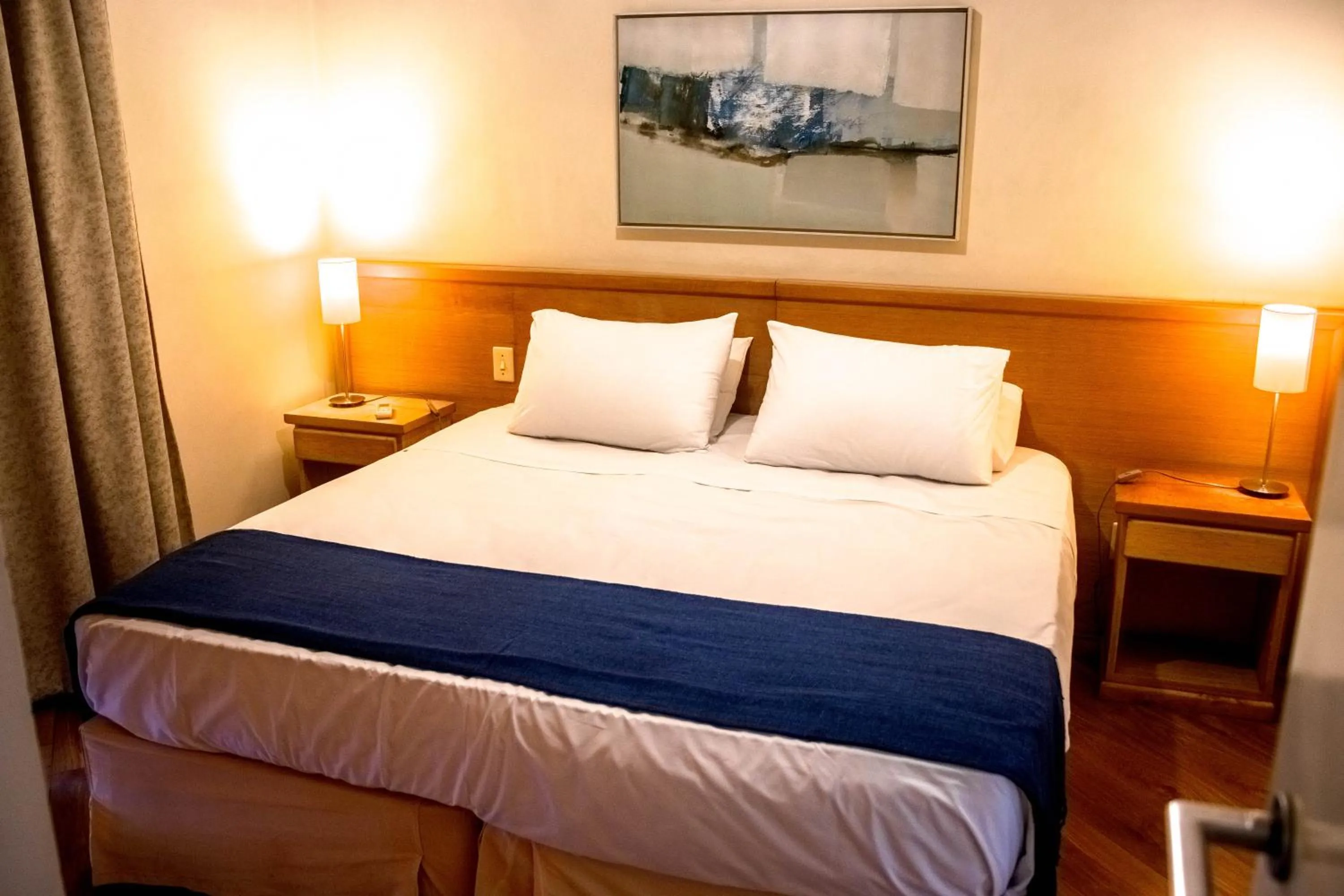 Bed in Residencial Bella Vista Suites