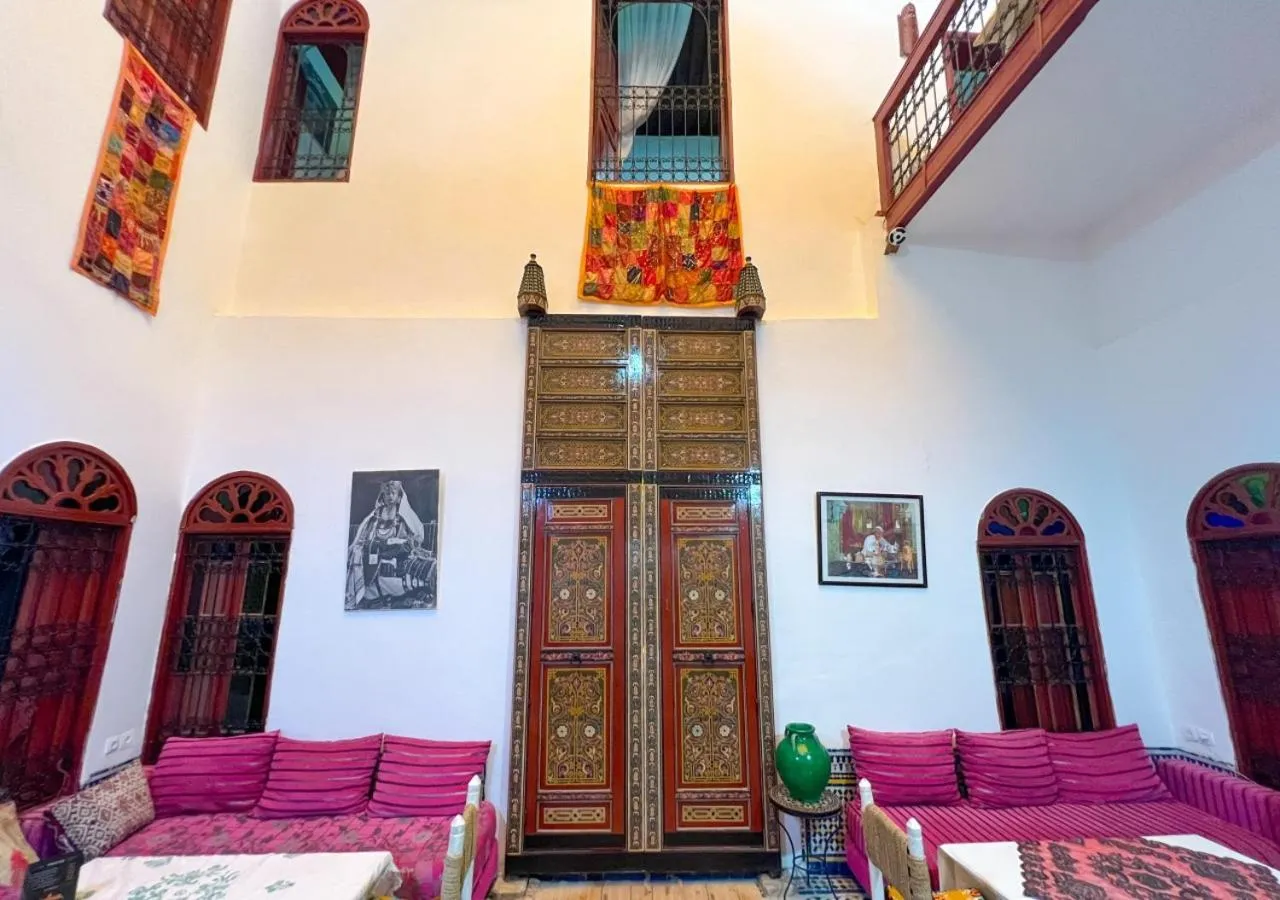 Living room, Bed in Riad Dar Iman