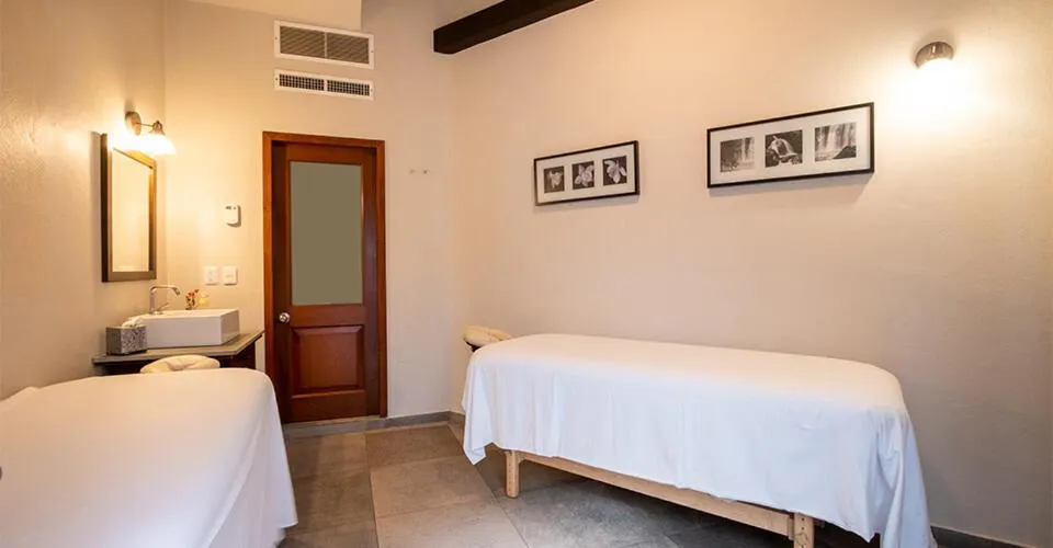 Bed in Casa Lucila Mazatlán Curamoria Collection