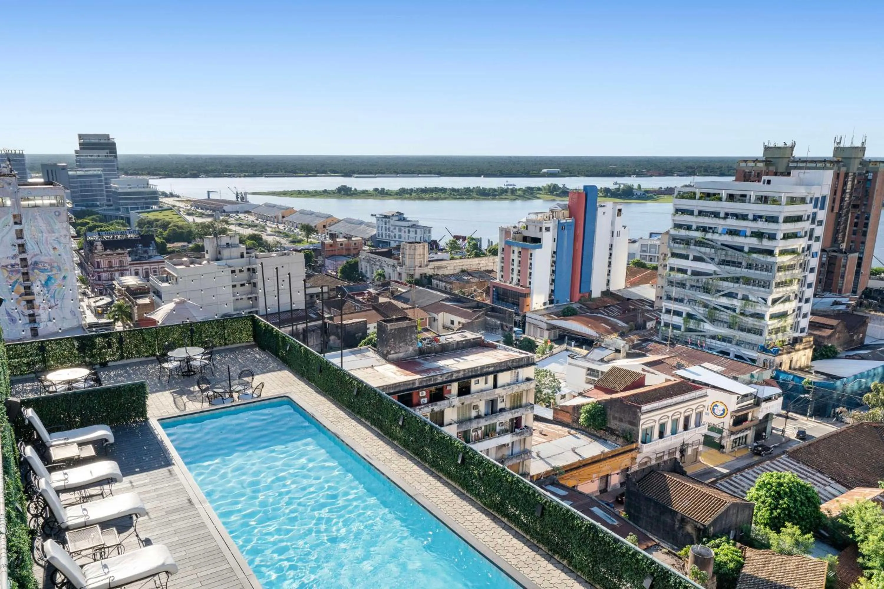 Pool view in Palmaroga Hotel Asuncion, Tapestry Collection by Hilton