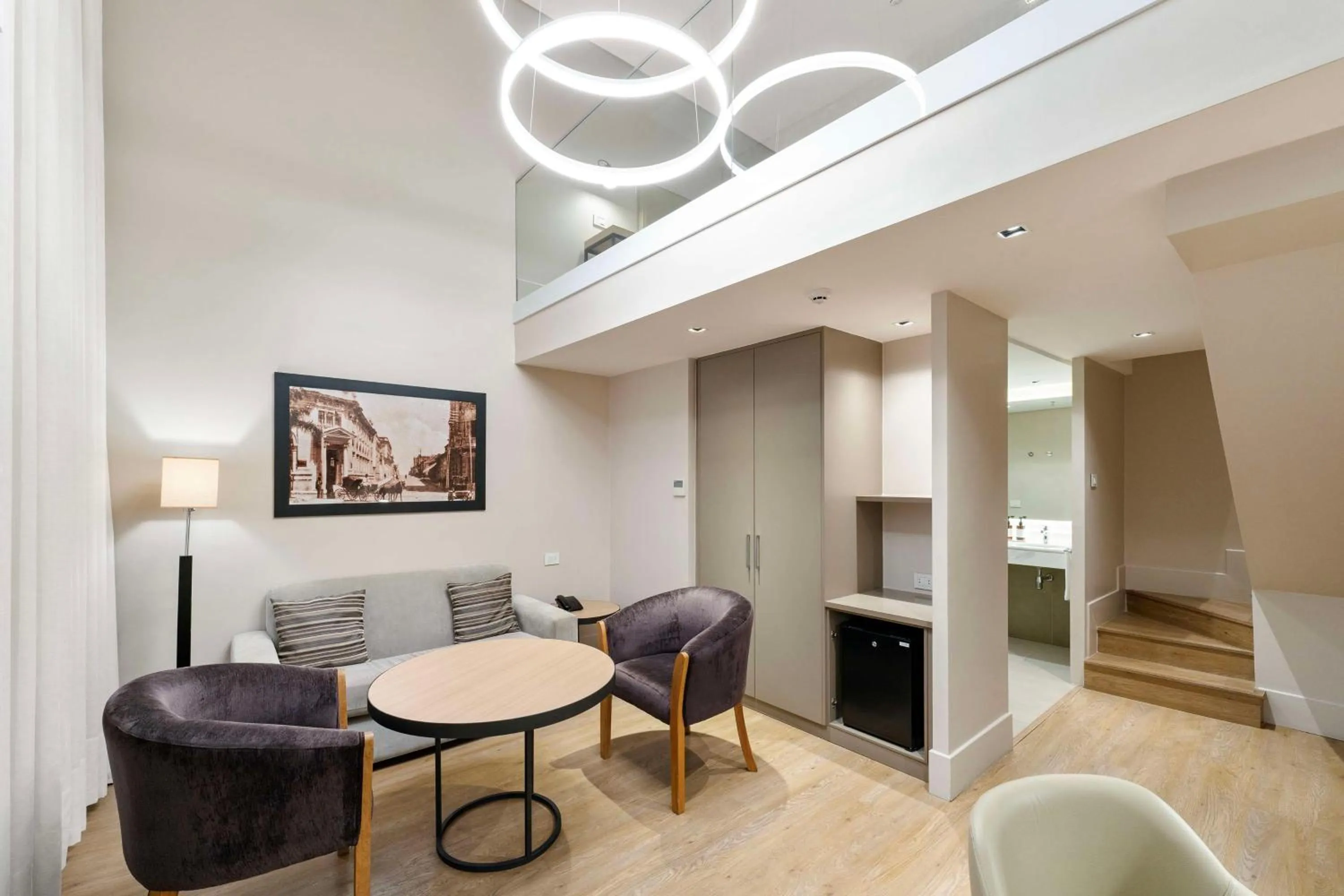 Living room in Palmaroga Hotel Asuncion, Tapestry Collection by Hilton